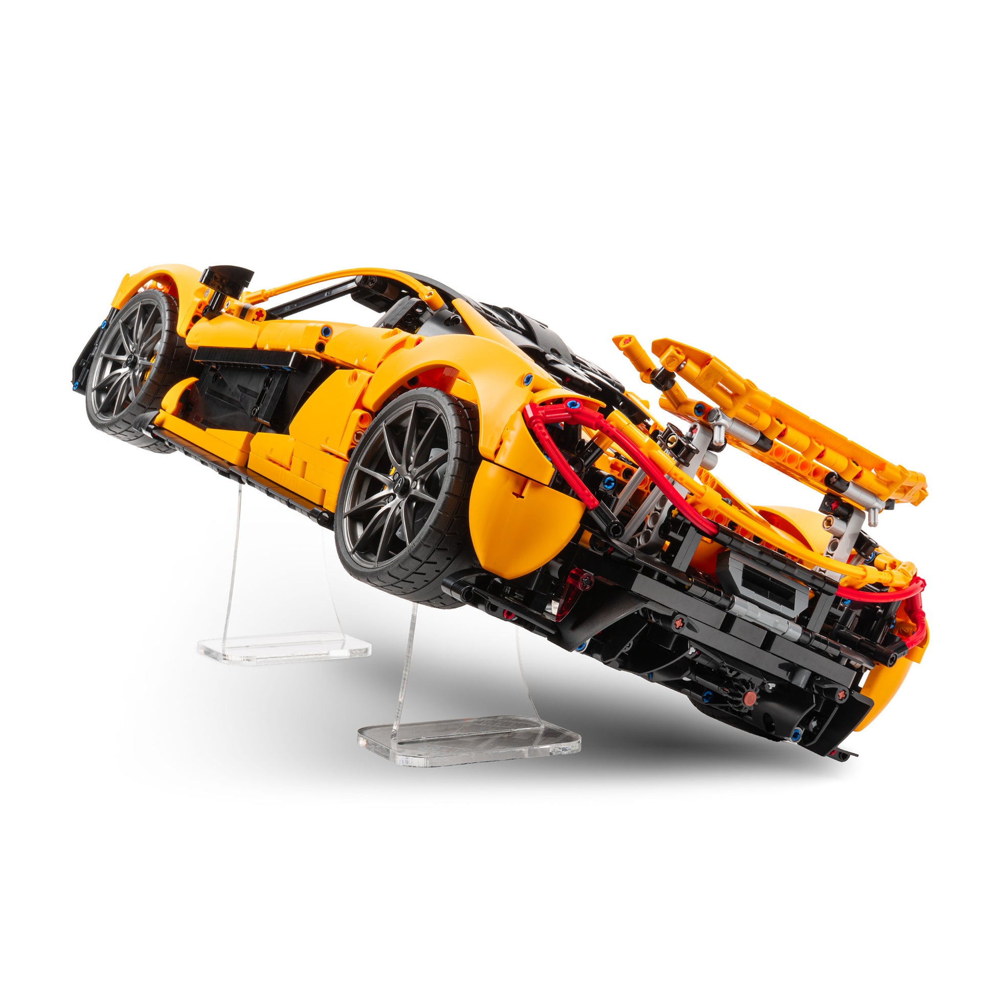 Back angled view of tall angled LEGO Technic display stand with 42172 McLaren P1.