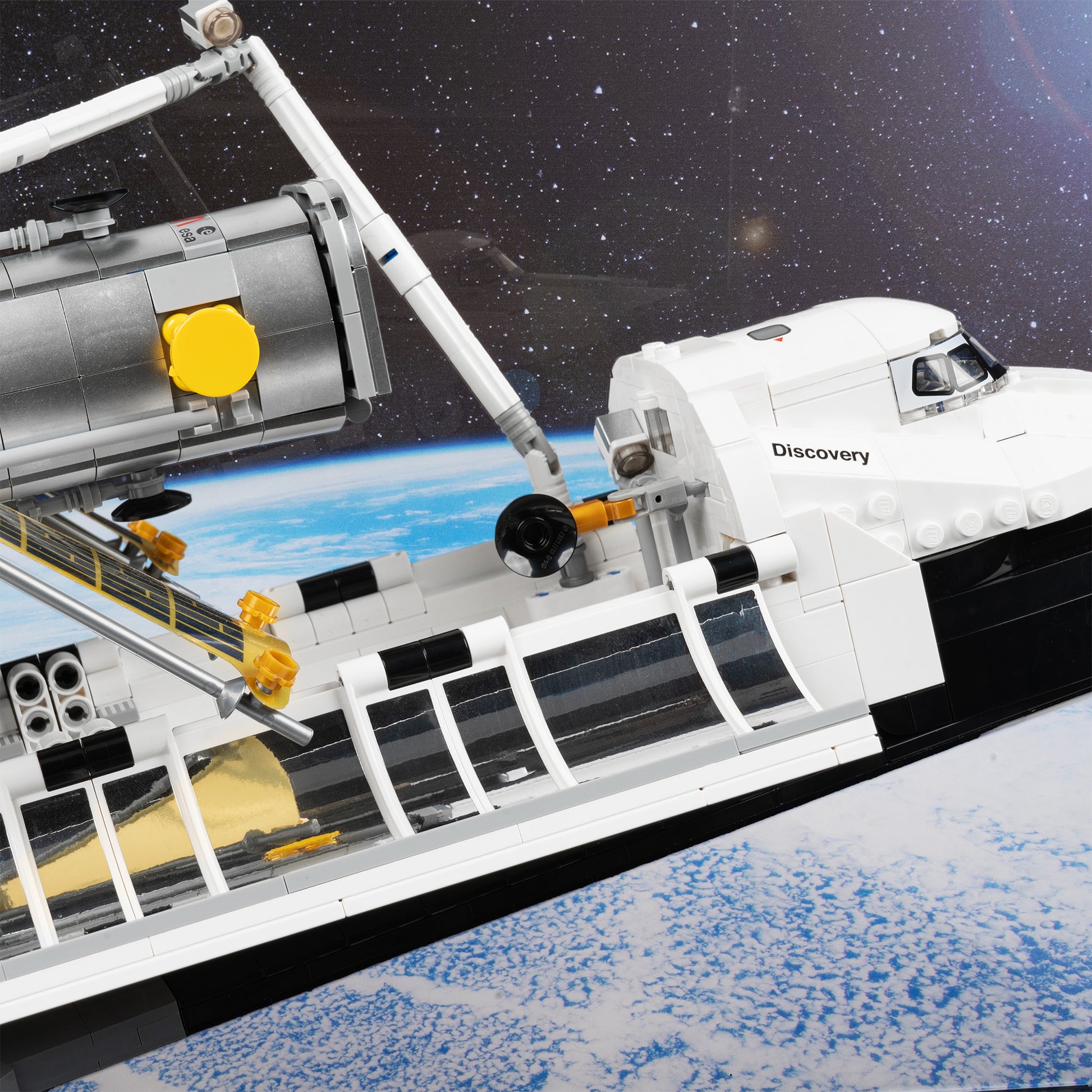 Bay detail view of LEGO 10283 NASA Space Shuttle Discovery Display Case with a UV printed background.