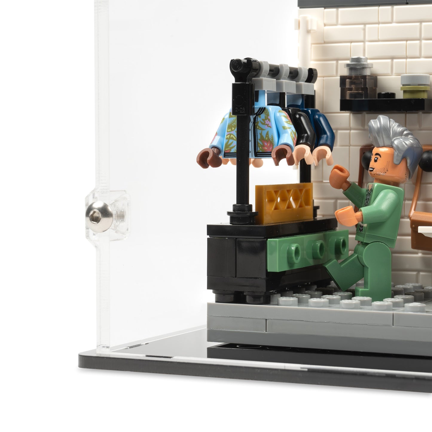 Fitting detail view of LEGO 10291 Queer Eye The Fab 5 Loft Display Case.