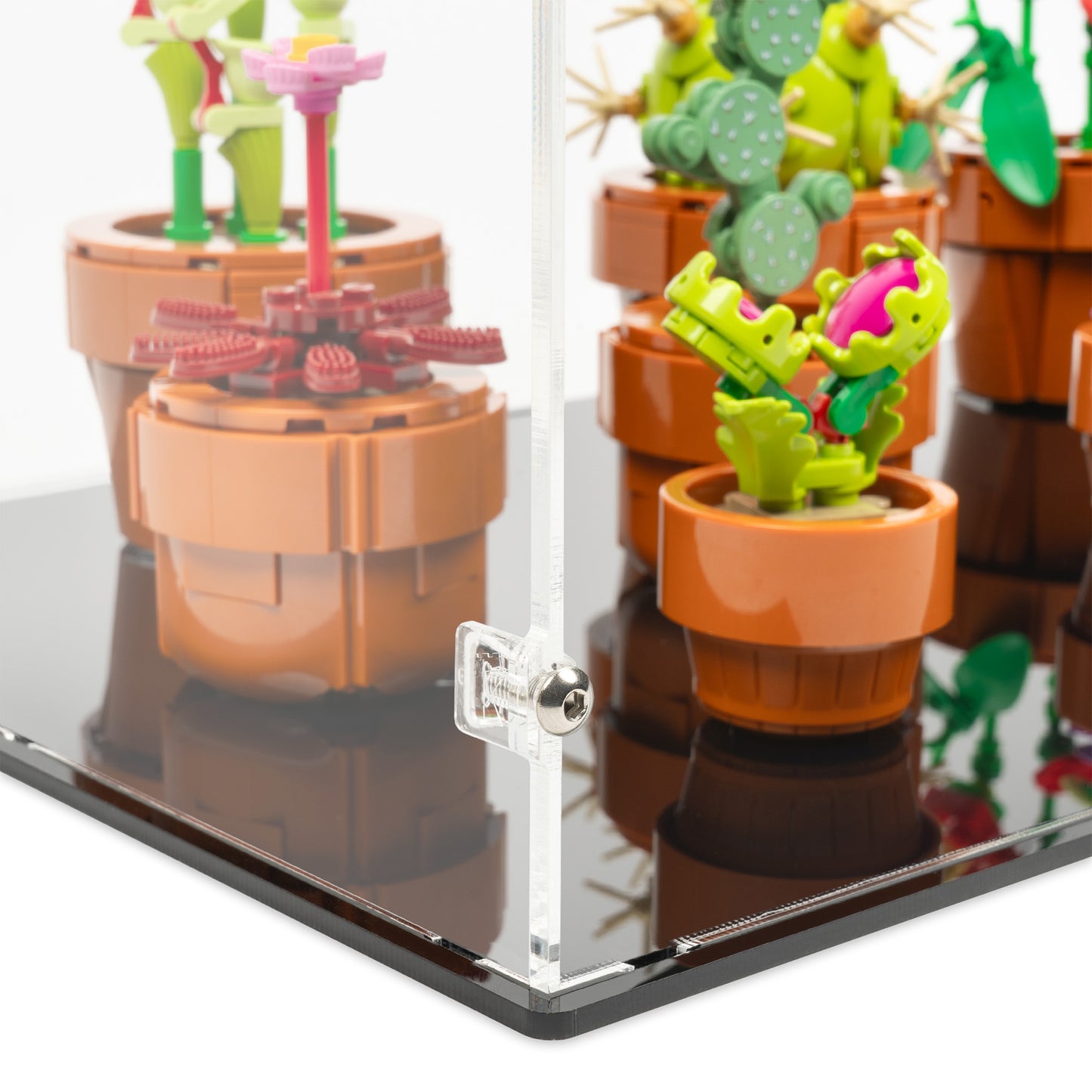 Fitting detail view of LEGO 10329 Tiny Plants Display Case.