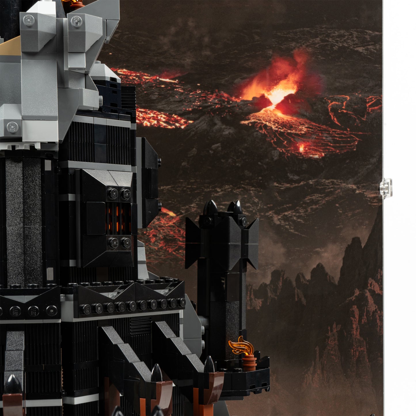 Lava detail view of LEGO 10333 The Lord of the Rings Barad-dûr Display Case with a UV printed background.