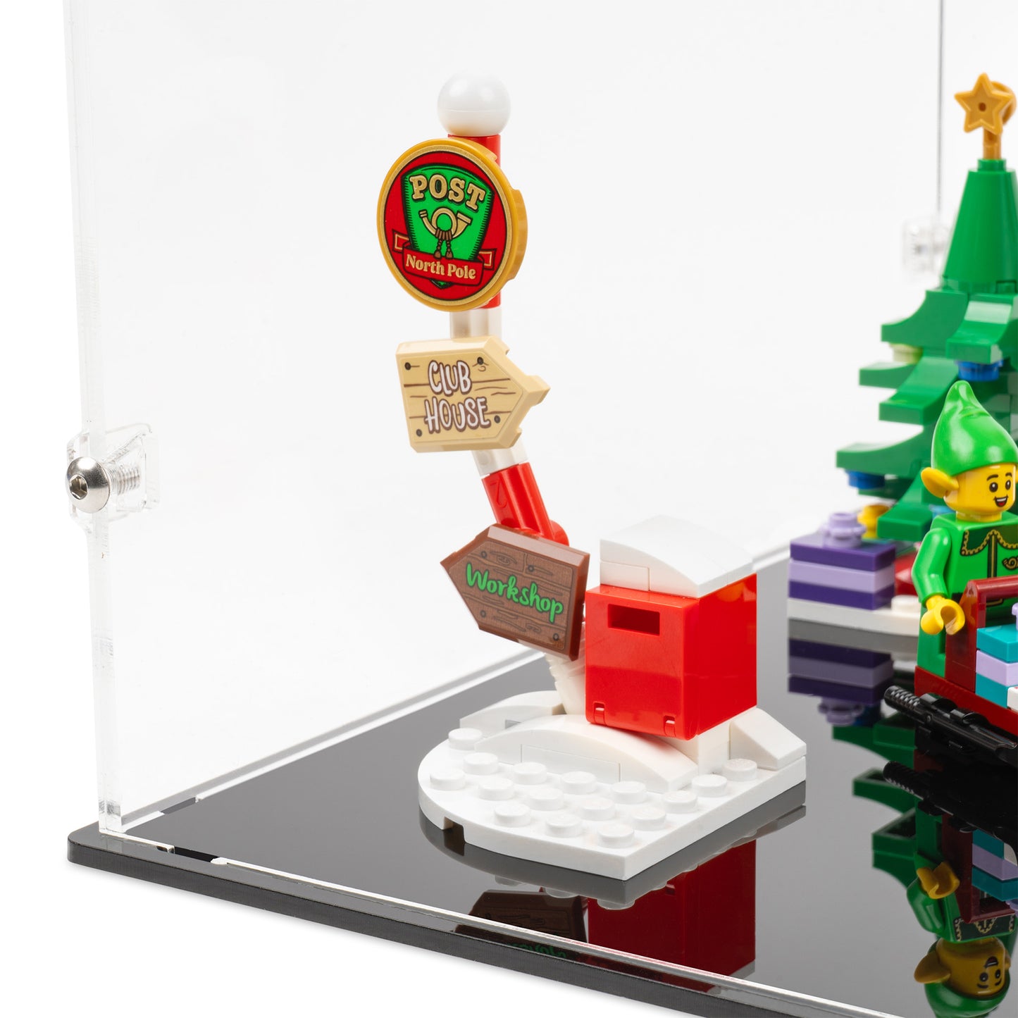 Fitting detail view of LEGO 10339 Santa's Post Office Display Case with a black base.
