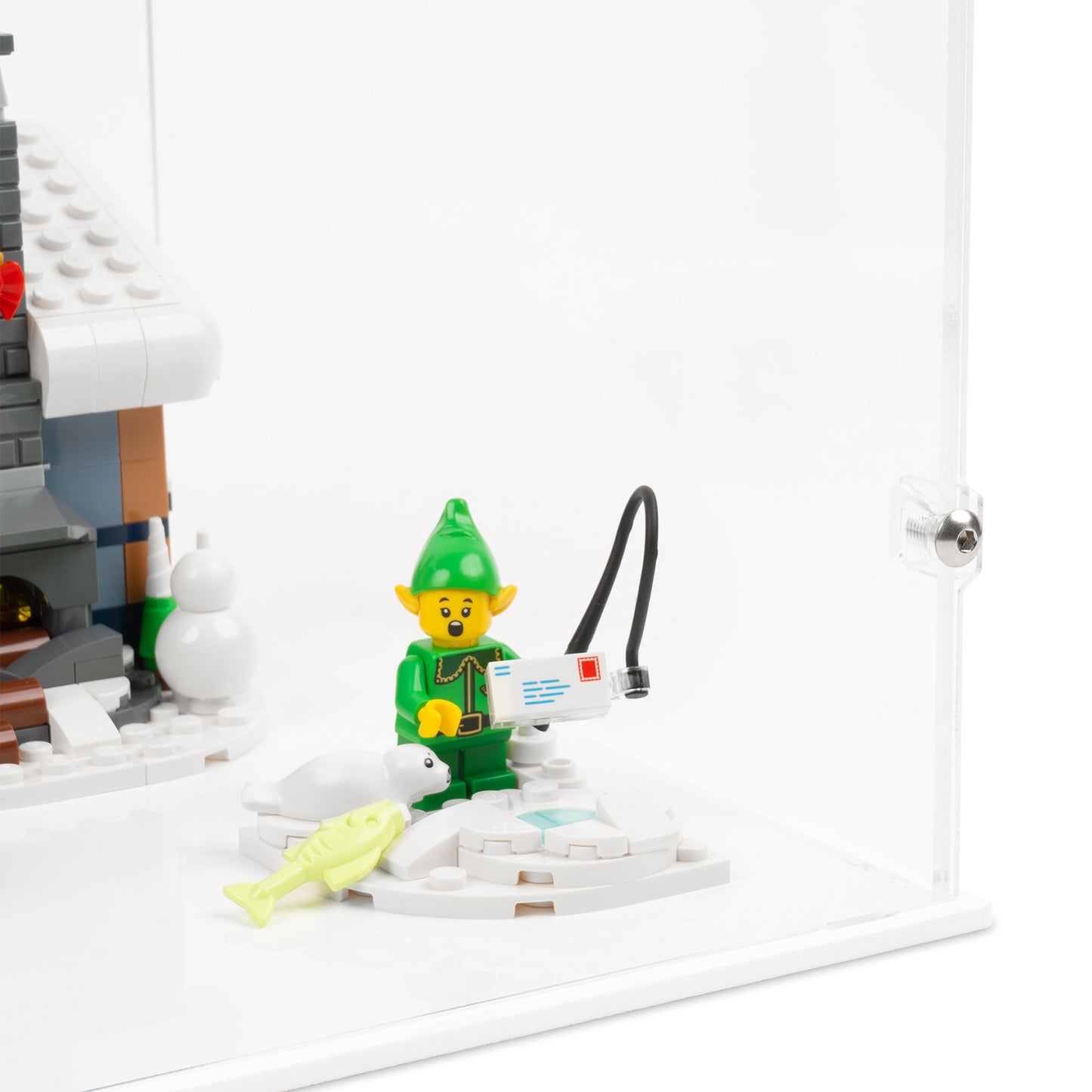 Fitting detail view of LEGO 10339 Santa's Post Office Display Case with a white base.