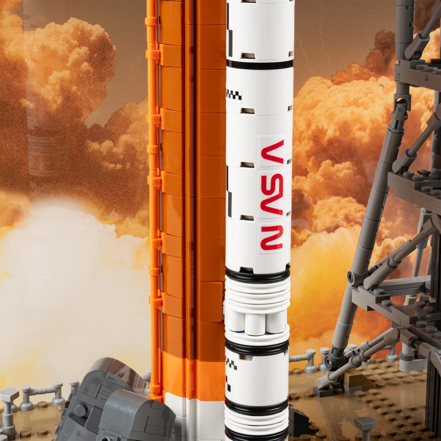 Rocket detail view of LEGO 10341 NASA Artemis Space Launch System Display Case with a UV printed background.