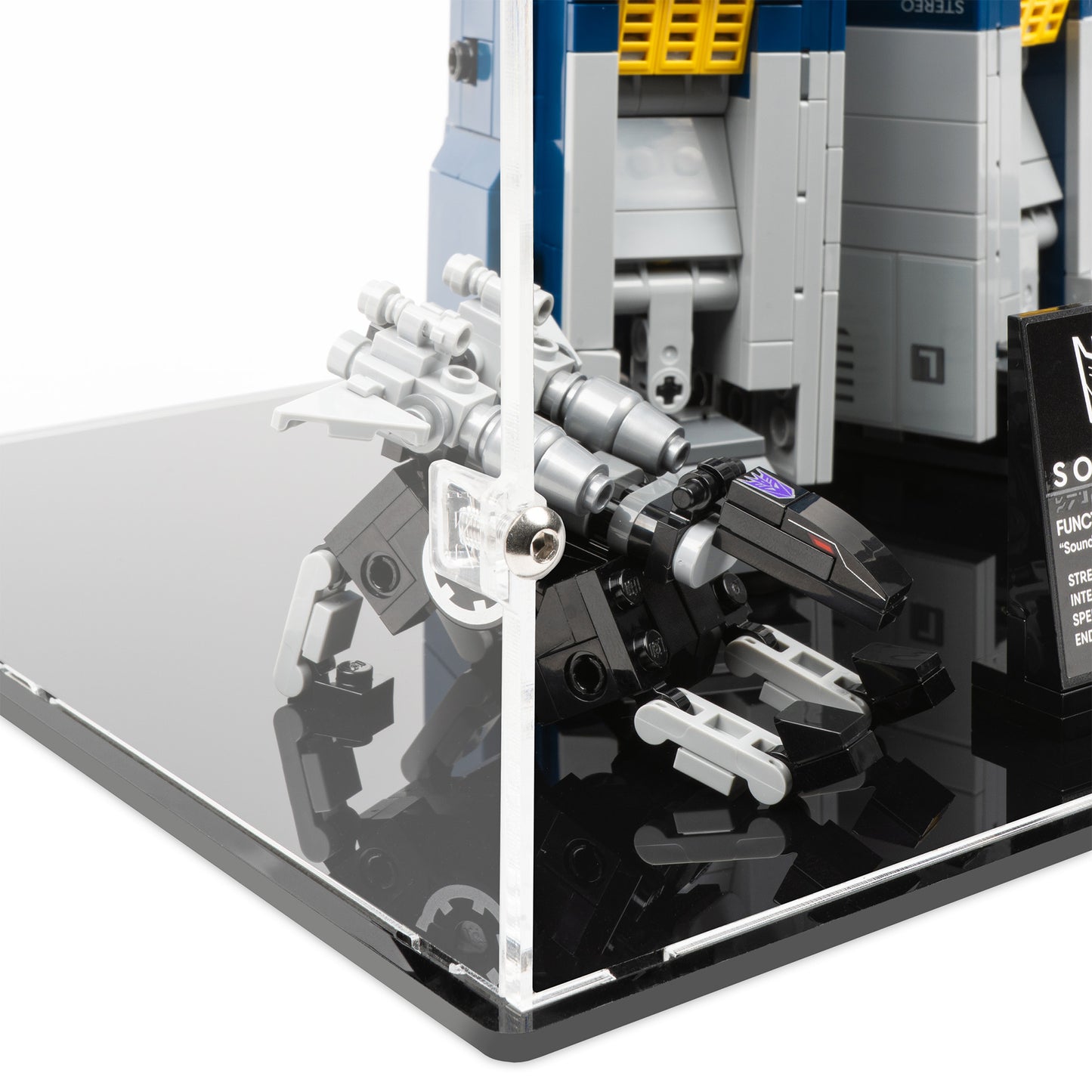 Fitting detail view of LEGO 10358 Soundwave Display Case.