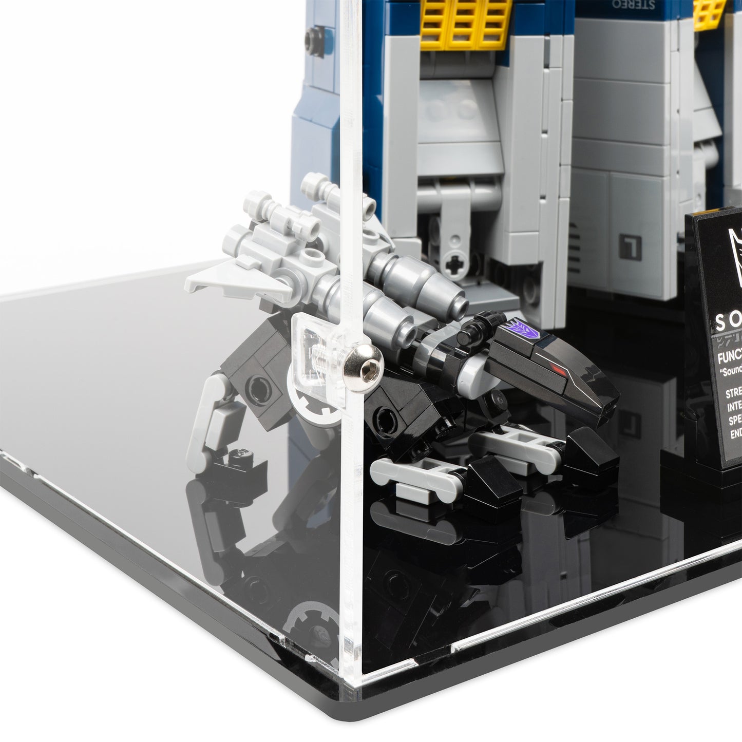 Fitting detail view of LEGO 10358 Soundwave Display Case.