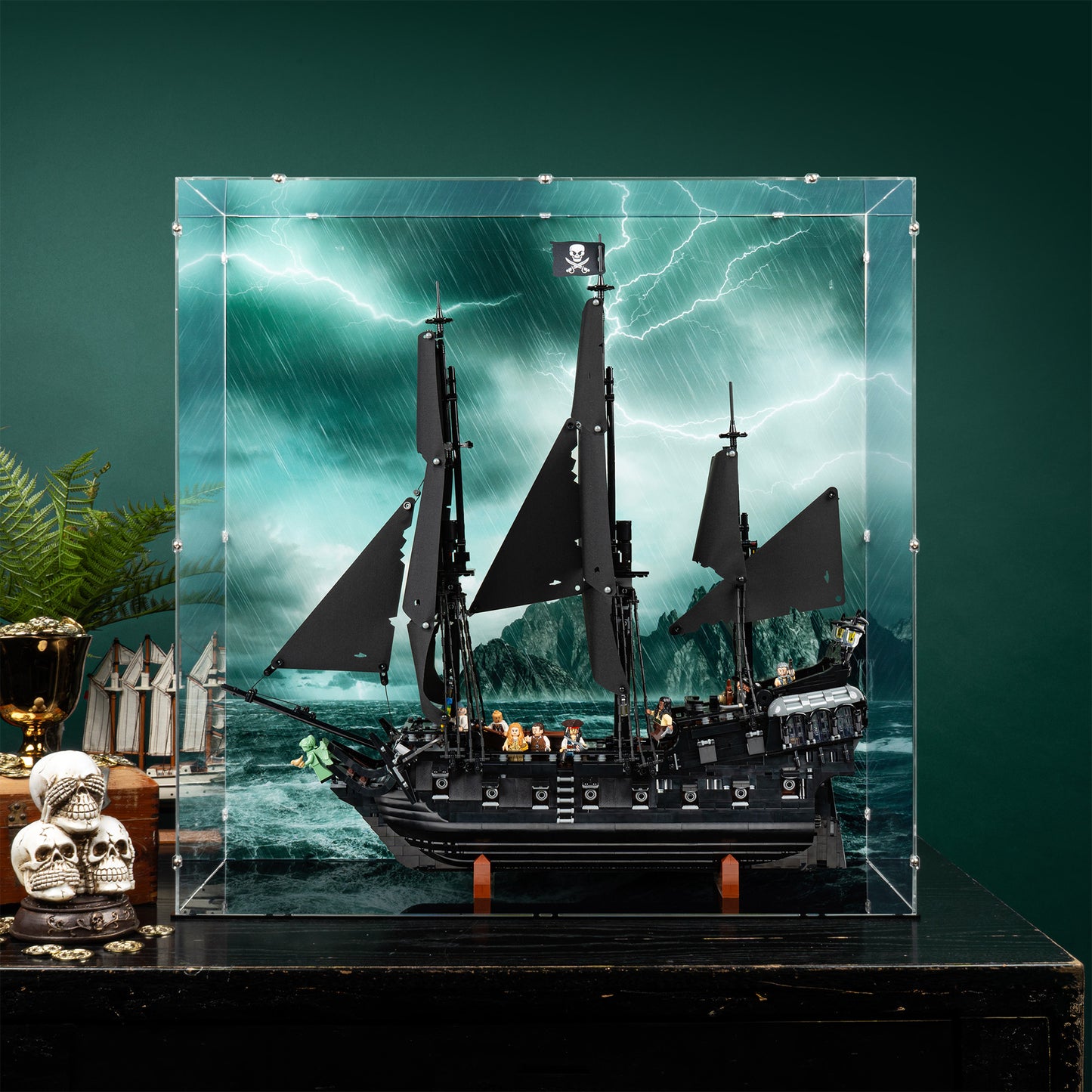 Lifestyle view of LEGO 10365 Captain Jack Sparrow's Pirate Ship Display Case with a UV printed background.