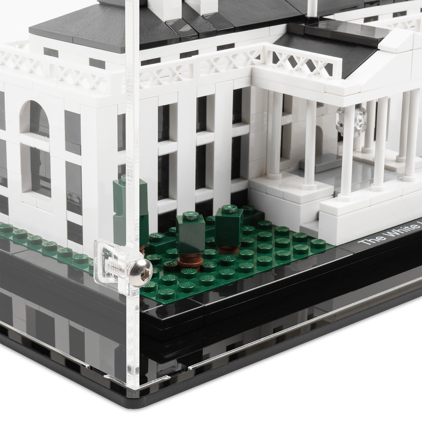 Fitting detail view of LEGO 21006 The White House Display Case.