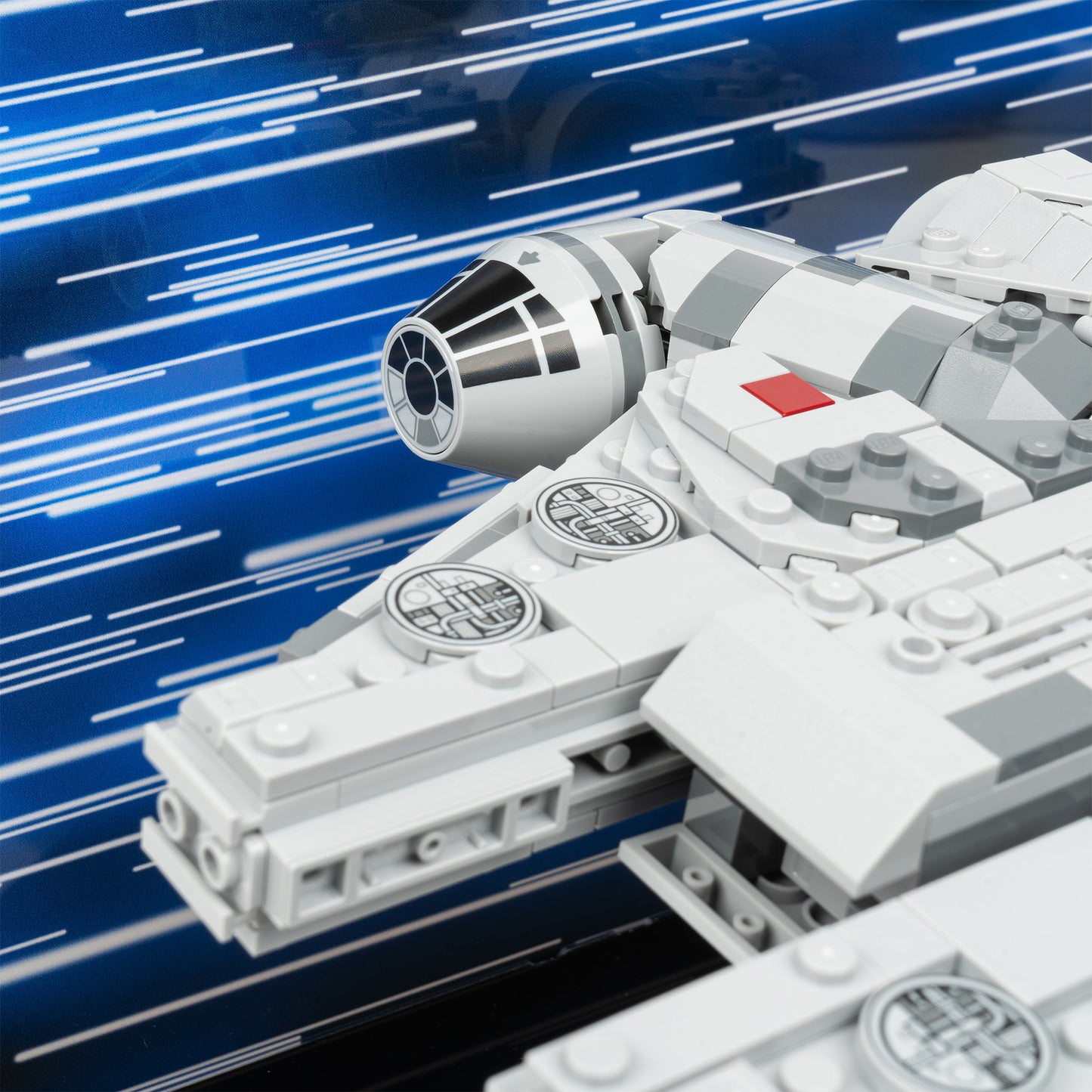 Cockpit detail view of LEGO 75375 Millennium Falcon Display Case with a UV printed background.