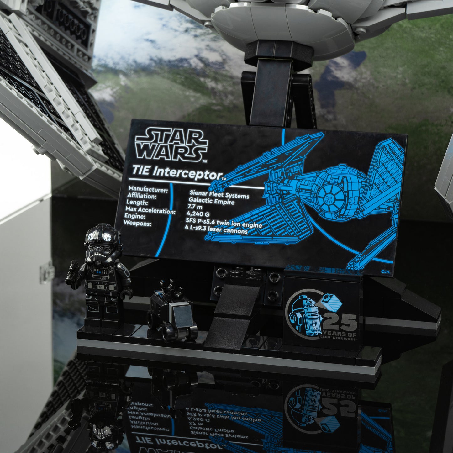 Plaque detail view of LEGO 75382 UCS TIE Interceptor Display Case with a UV printed background.