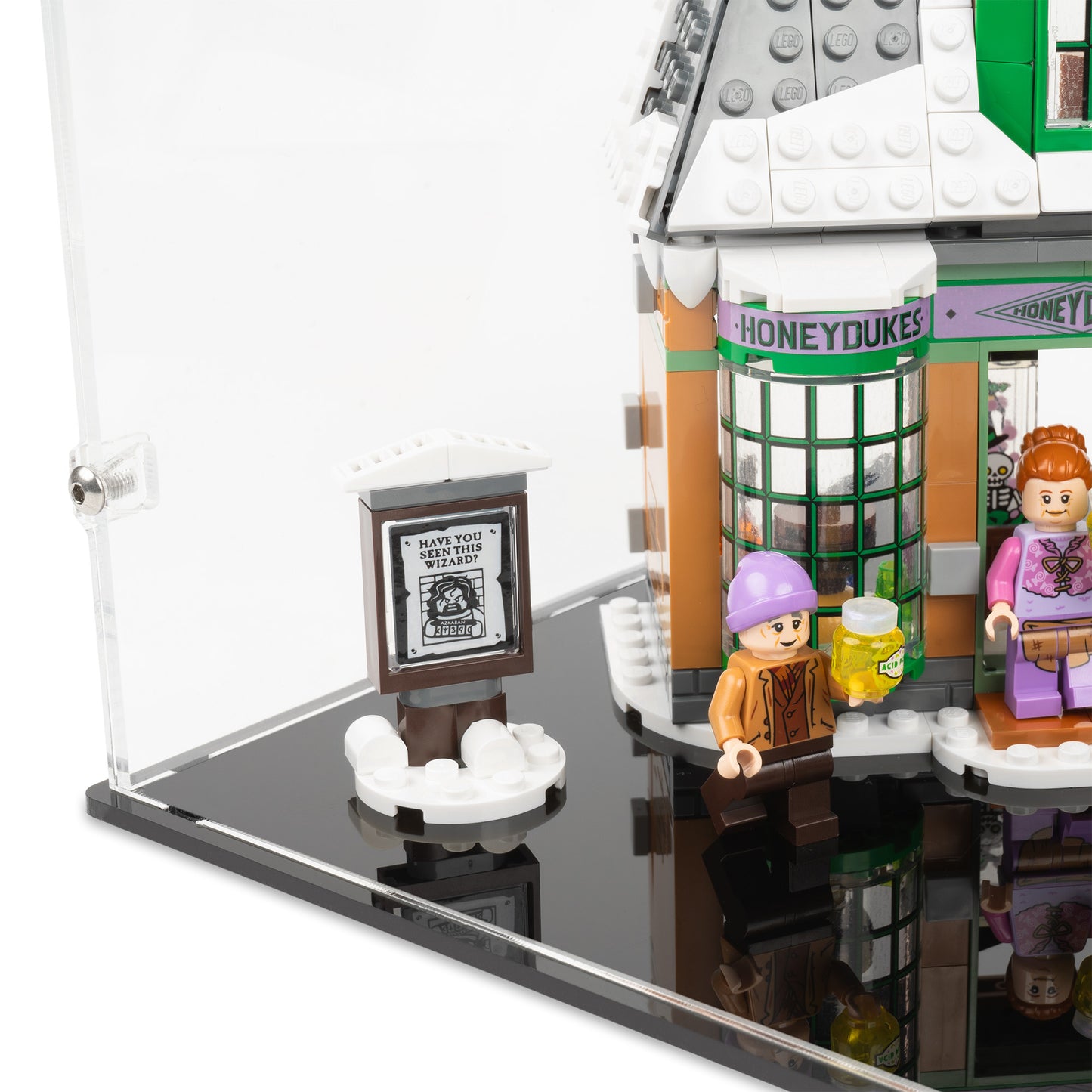Fitting detail view of LEGO 76388 Hogsmeade Village Visit Display Case with a black base.