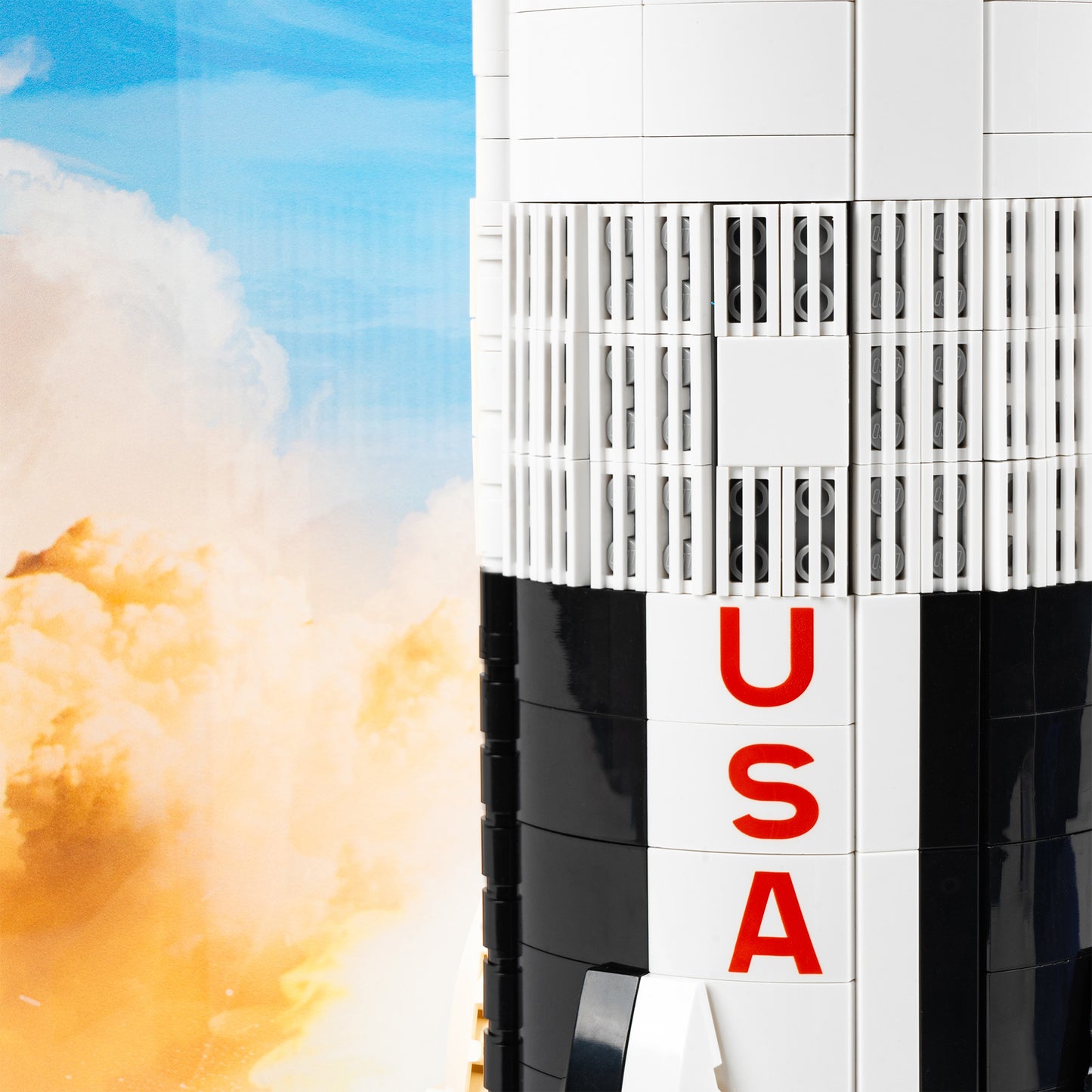 Rocket detail view of LEGO 92176/21309 NASA Apollo Saturn V Vertical Display Case with a UV printed background.