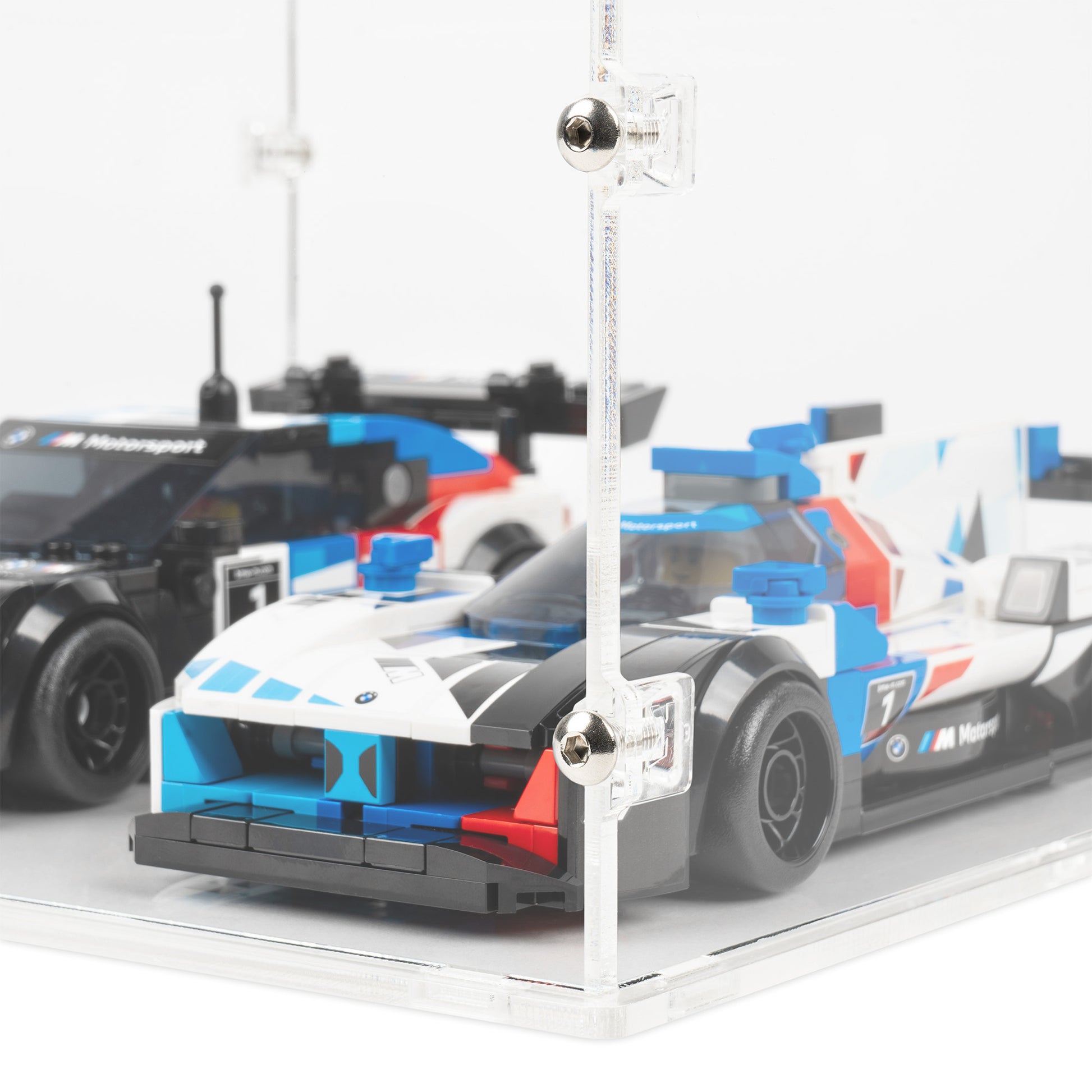 Fitting detail view of 2x LEGO Speed Champions Perpendicular Display Case with a clear base.