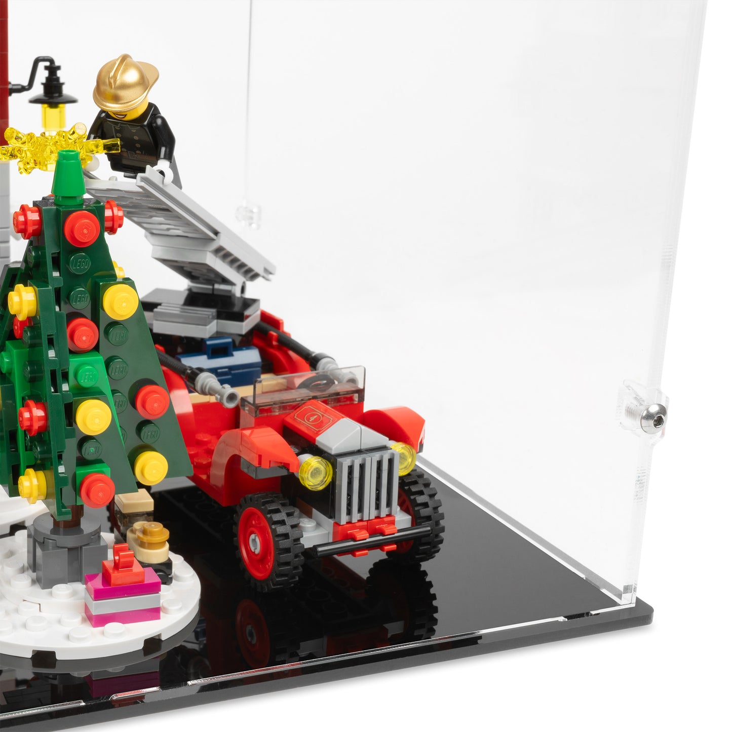 Fitting detail view of LEGO 10263 Winter Village Fire Station Display Case with a black base.