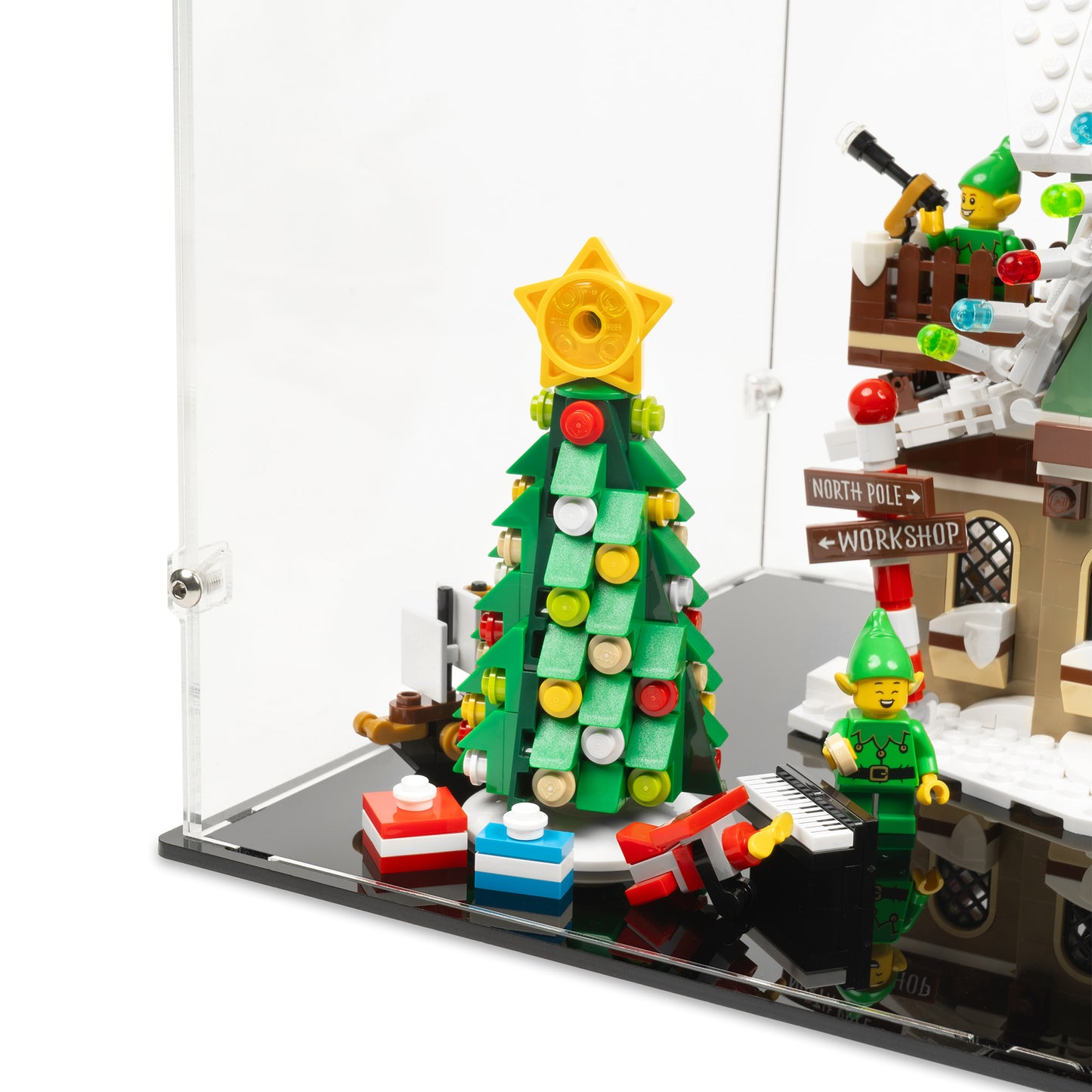 Fitting detail view of LEGO 10275 Elf Club House Display Case with a black base.