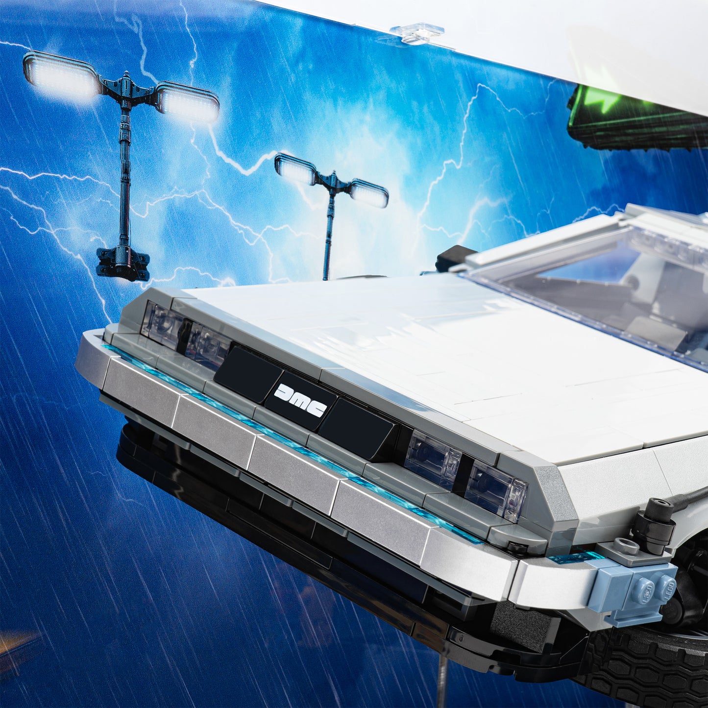 Detail view of LEGO 10300 Back to the Future Time Machine Display Case and Stand with a UV printed Skyway background.
