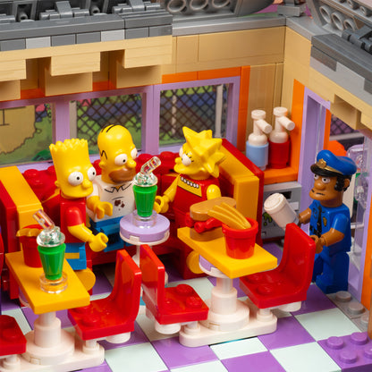 Interior detail view of LEGO 10352 The Simpsons Krusty Burger Display Case with a UV printed background.