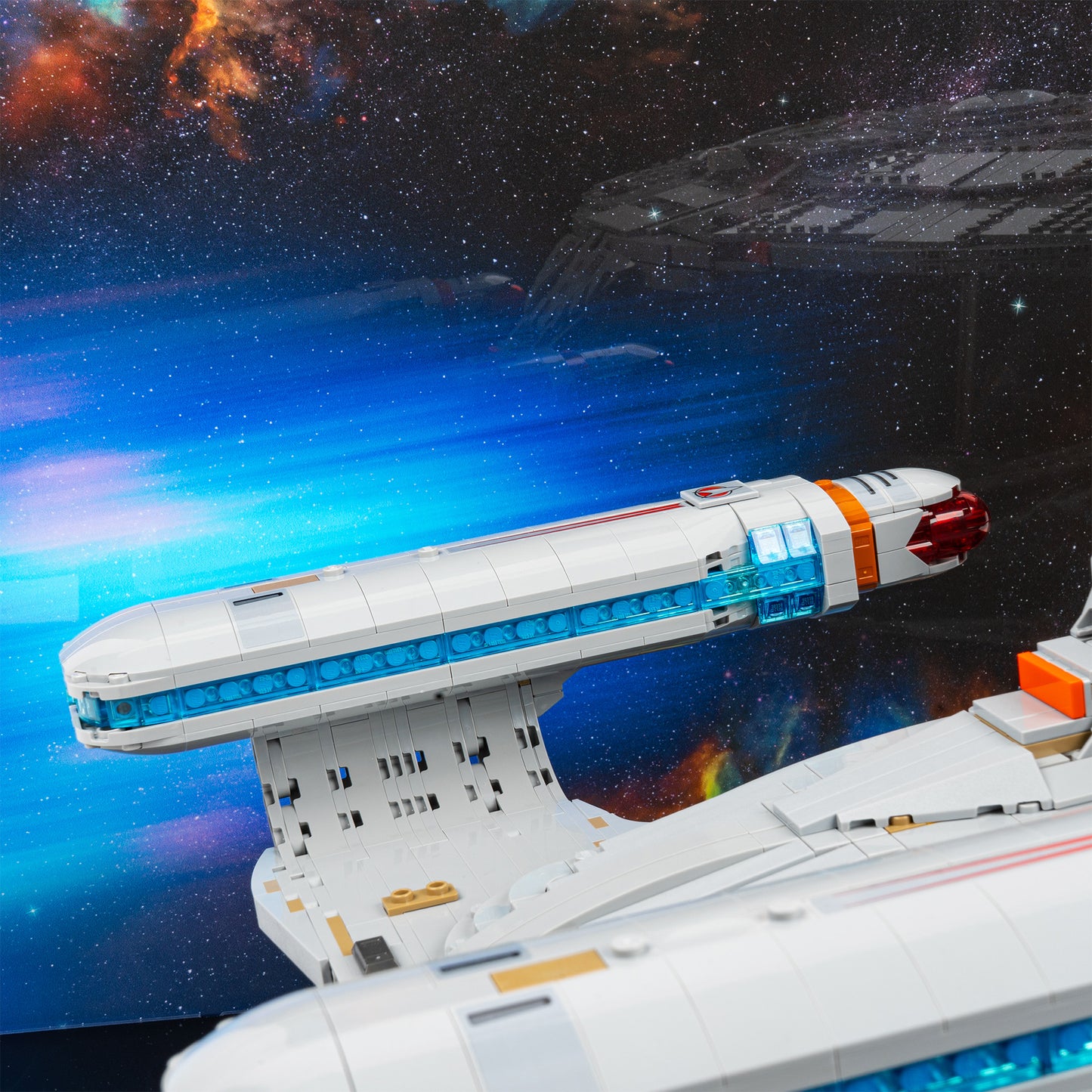 Warp engines detail view of LEGO 10356 Star Trek USS Enterprise NCC-1701-D Display Case with a UV printed background.