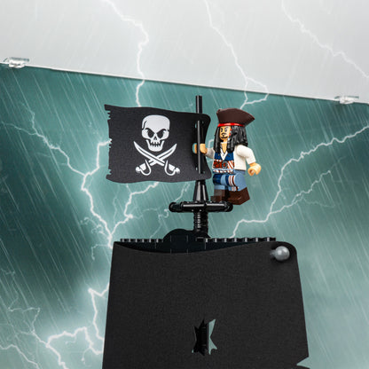 Mast detail view of LEGO 10365 Captain Jack Sparrow's Pirate Ship Display Case with a UV printed background.