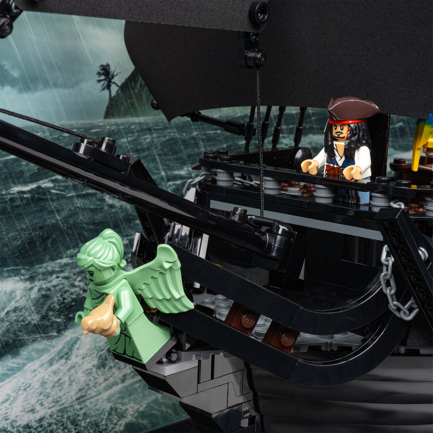 Bowsprit detail view of LEGO 10365 Captain Jack Sparrow's Pirate Ship Display Case with a UV printed background.