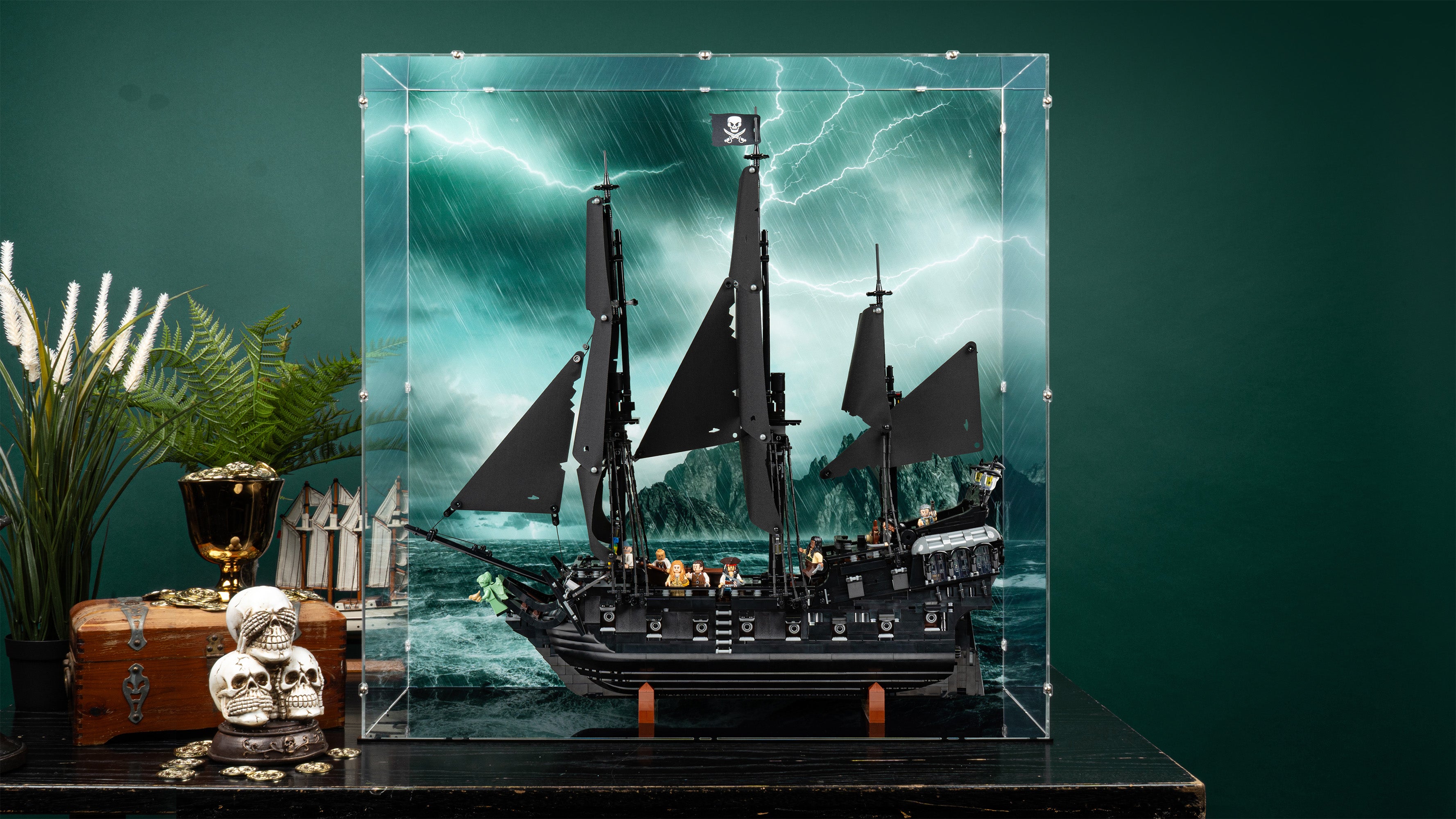 LEGO 10365 Captain Jack Sparrow's Pirate Ship Display Case with a UV printed background.