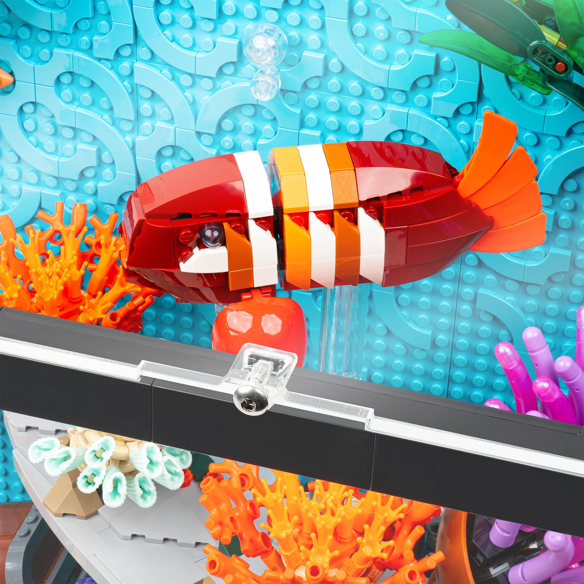 Top fitting detail view of LEGO 10366 Tropical Aquarium Display Case.