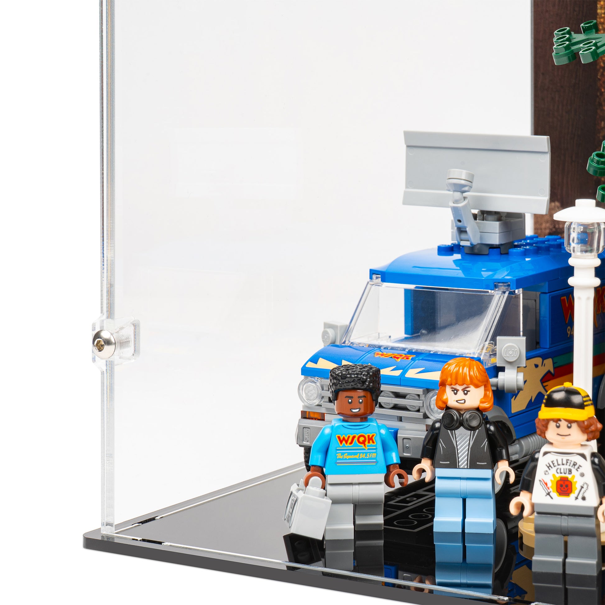 Van detail view of LEGO 11370 Stranger Things The Creel House Closed Display Case with a UV printed background.