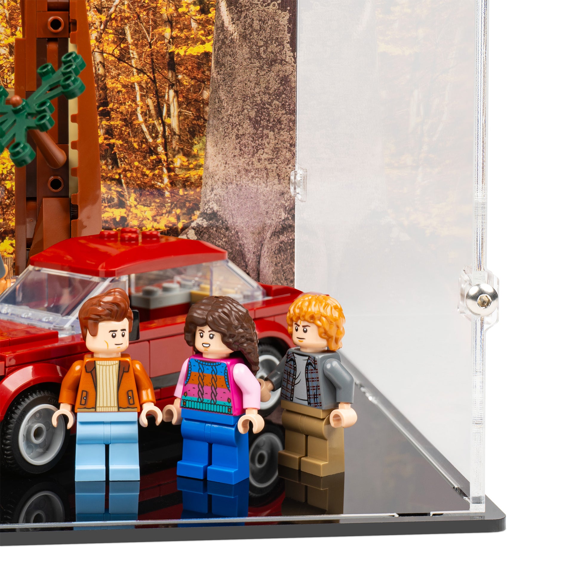 Fitting detail view of LEGO 11370 Stranger Things The Creel House Closed Display Case with a UV printed background.