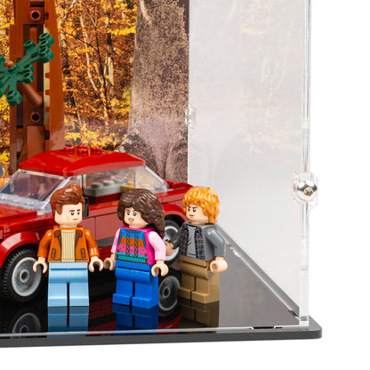 Fitting detail view of LEGO 11370 Stranger Things The Creel House Closed Display Case with a UV printed background.