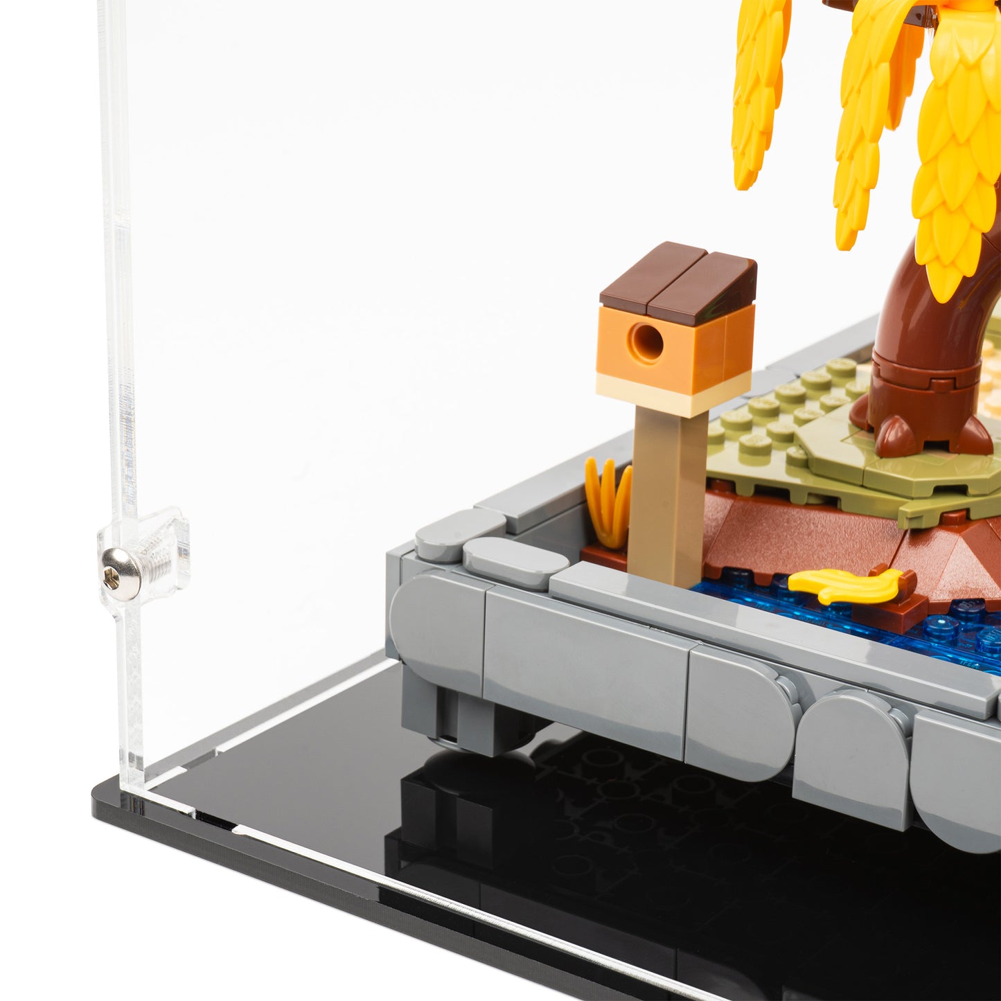 Left fitting detail view of LEGO 11372 Autumn Cottage Garden Display Case.