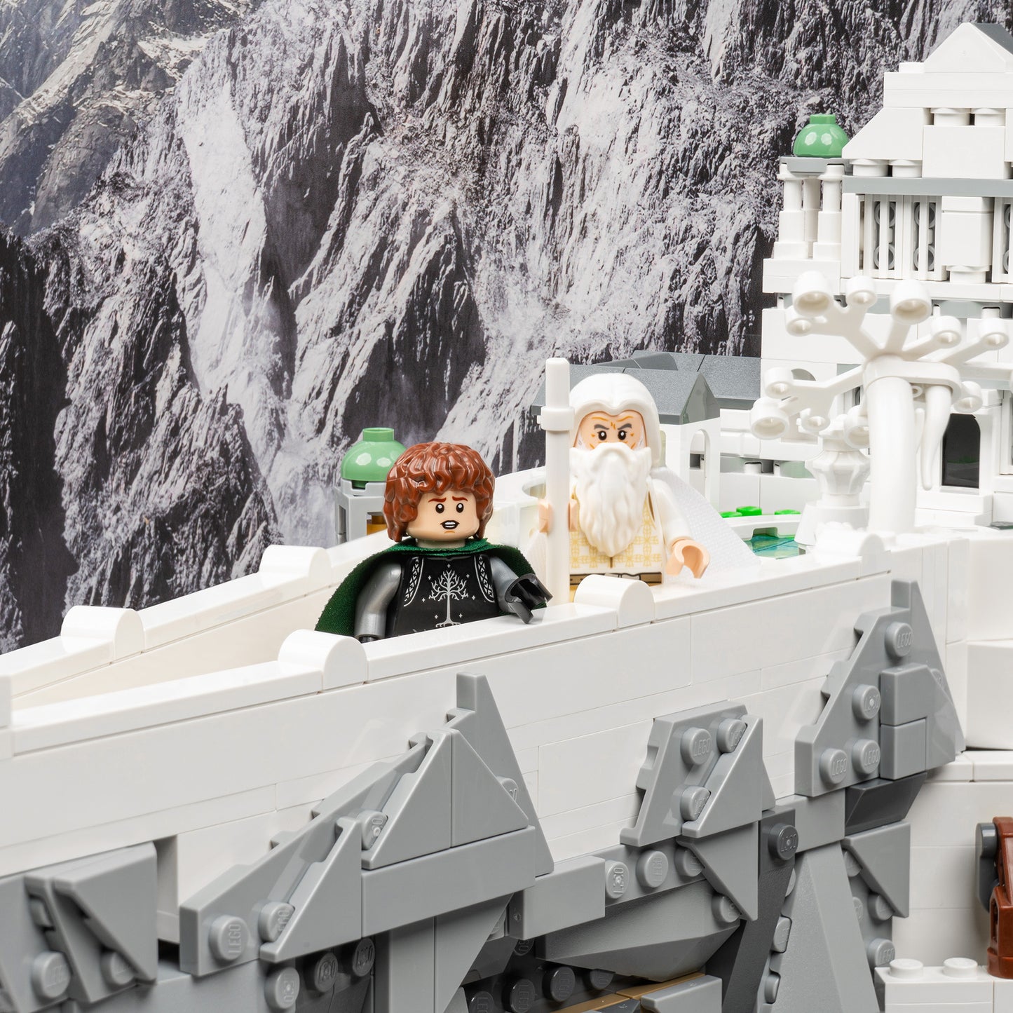 Pippin and Gandalf detail view of LEGO 11377 The Lord of the Rings Minas Tirith Display Case with a UV printed background.