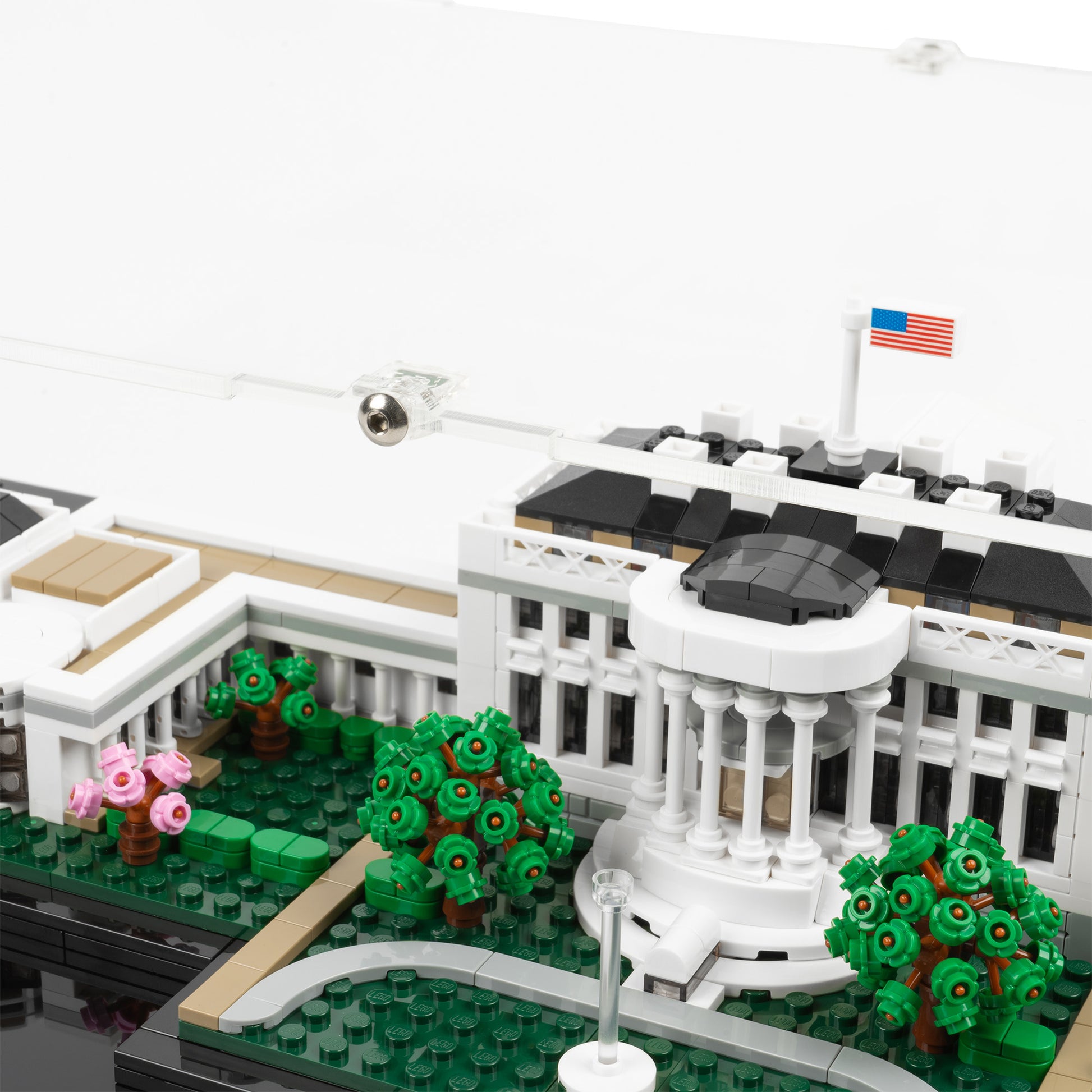 Fitting detail view of LEGO 21054 The White House Display Case.
