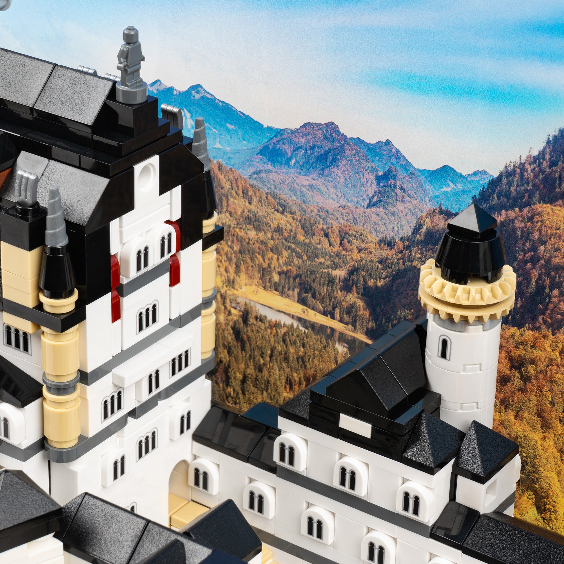 Courtyard detail view of LEGO 21063 Neuschwanstein Castle Display Case with a UV printed background.