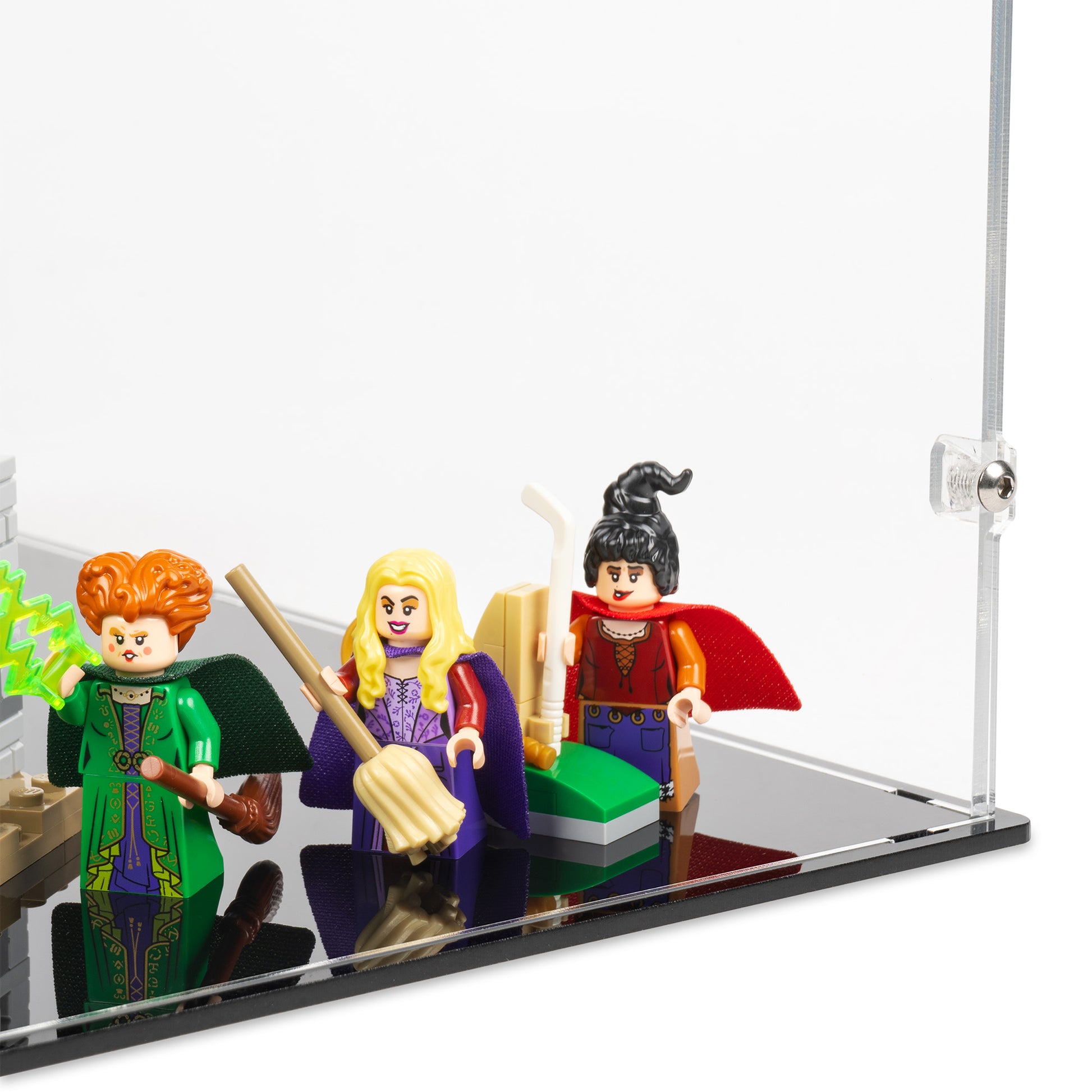 Fitting detail view of LEGO 21341 Disney Hocus Pocus The Sanderson Sisters' Cottage Display Case.