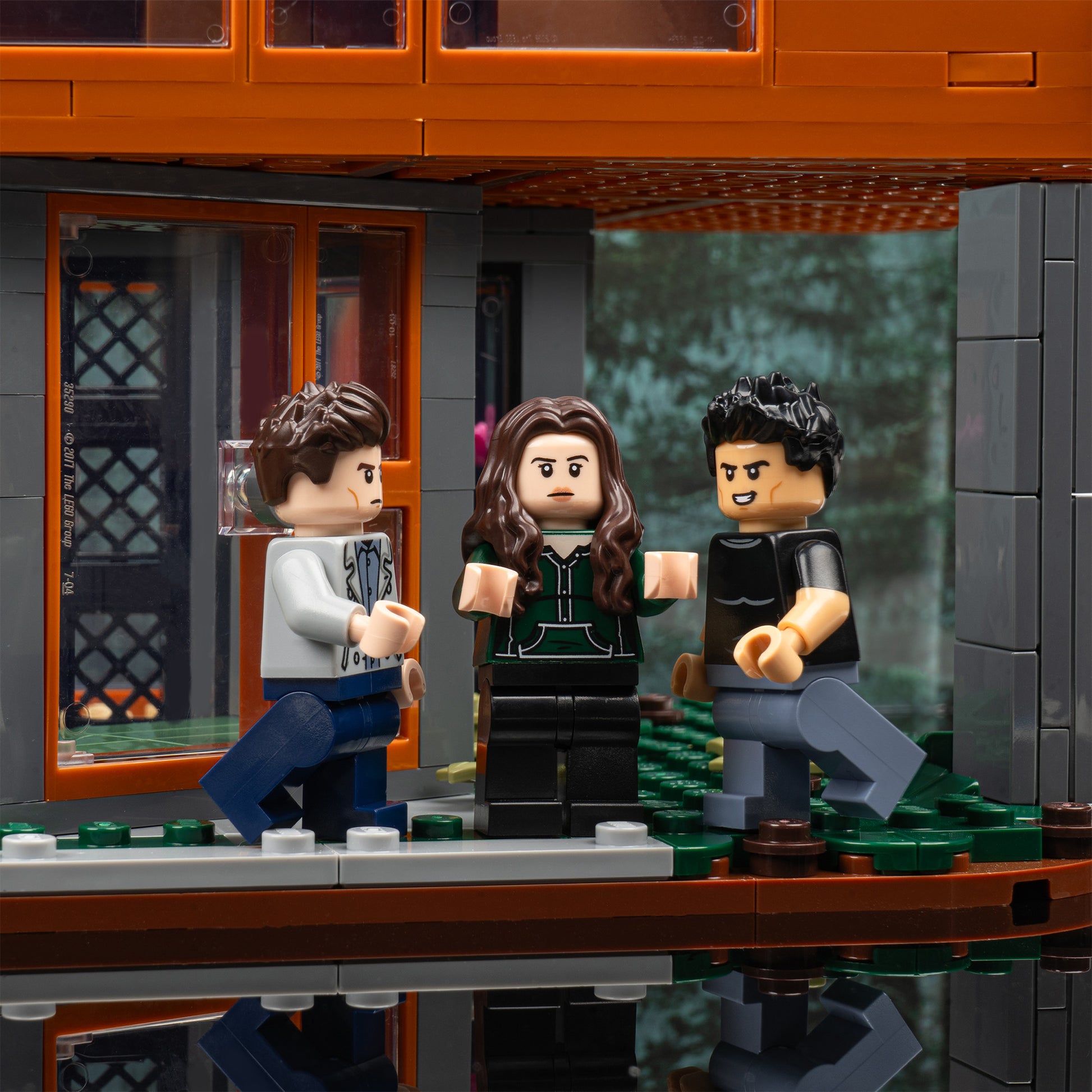 Entrance detail view of LEGO 21354 Twilight The Cullen House Display Case with a UV printed background.