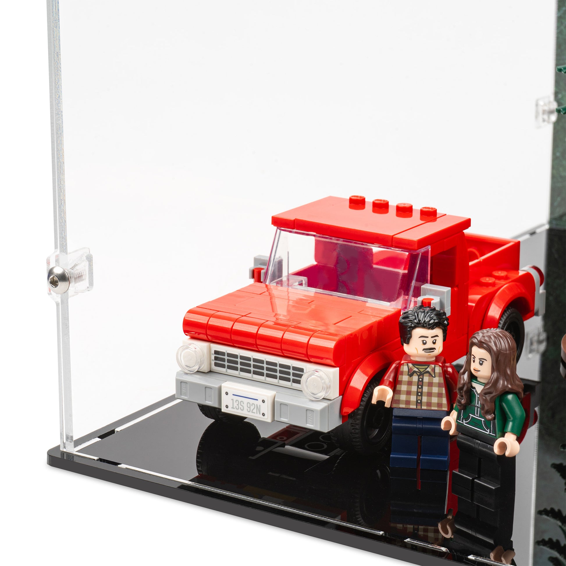 Fitting detail view of LEGO 21354 Twilight The Cullen House Display Case with a UV printed background.