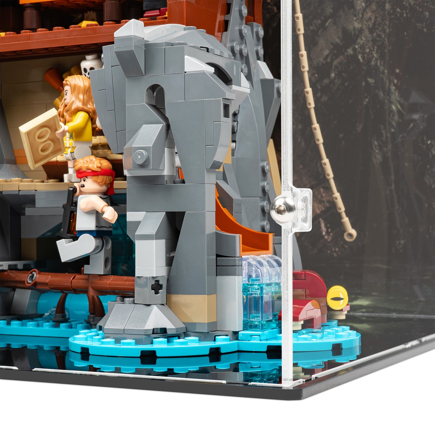 Fitting detail view of LEGO 21363 The Goonies Display Case with a UV printed background.