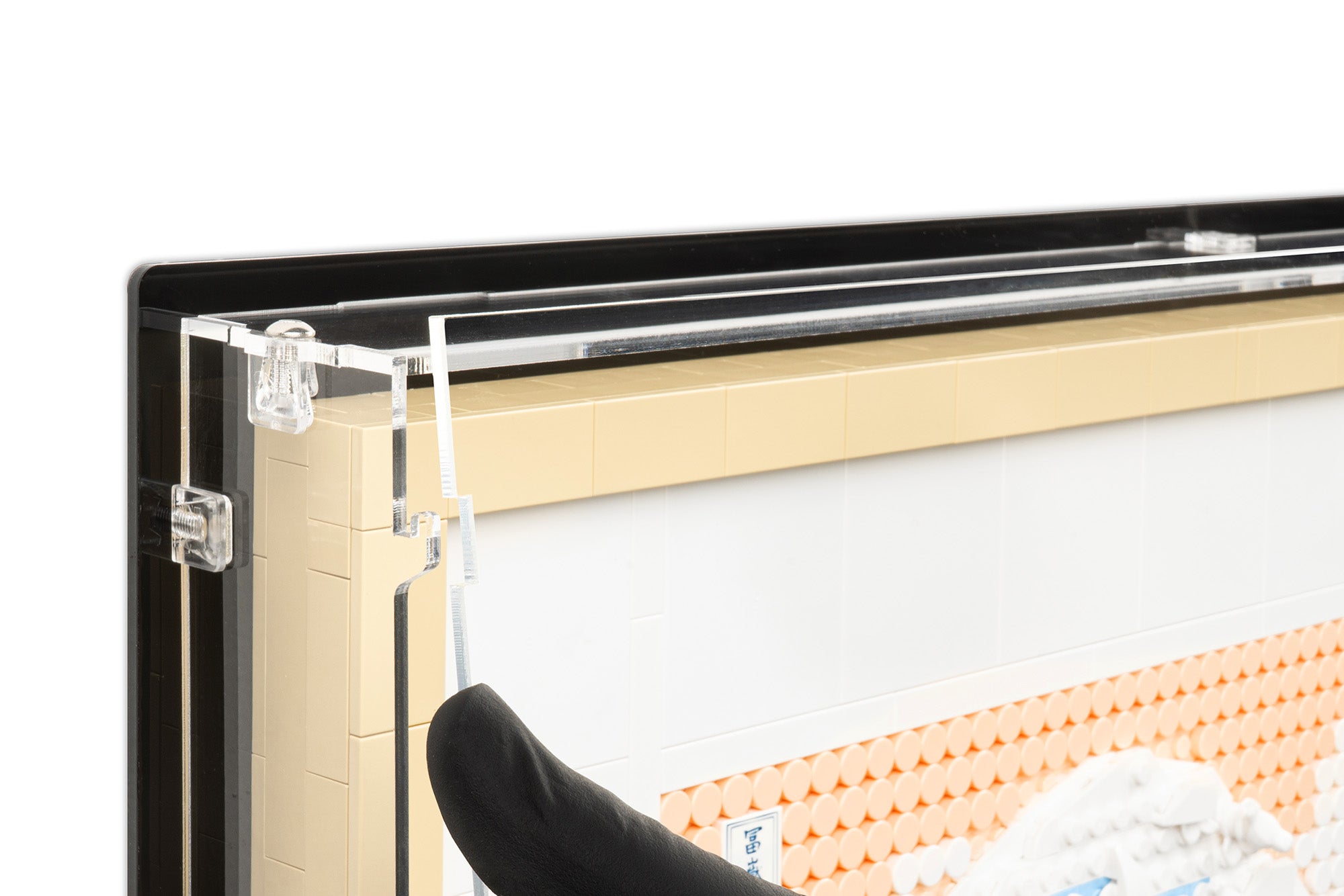 Removable front on LEGO 31208 Hokusai – The Great Wave Wall-Mounted Display Case.