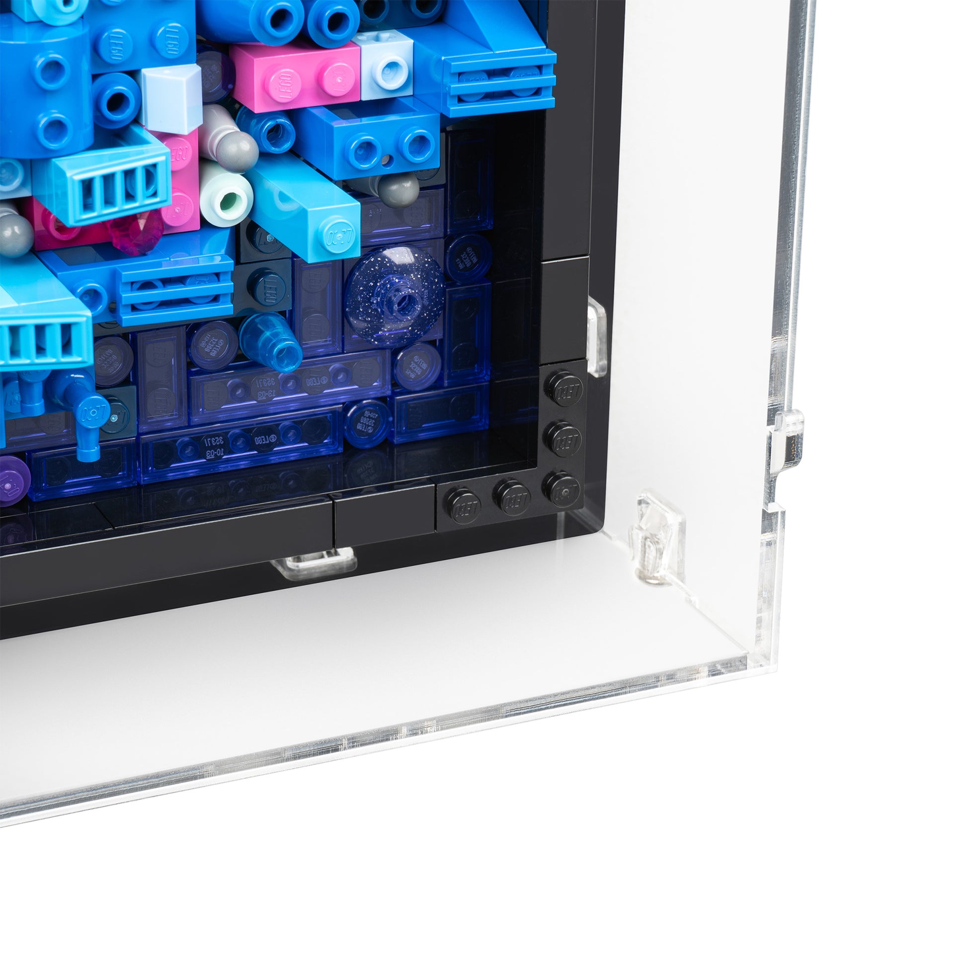 Fitting detail view of LEGO 31212 The Milky Way Galaxy Wall-Mounted Display Case.
