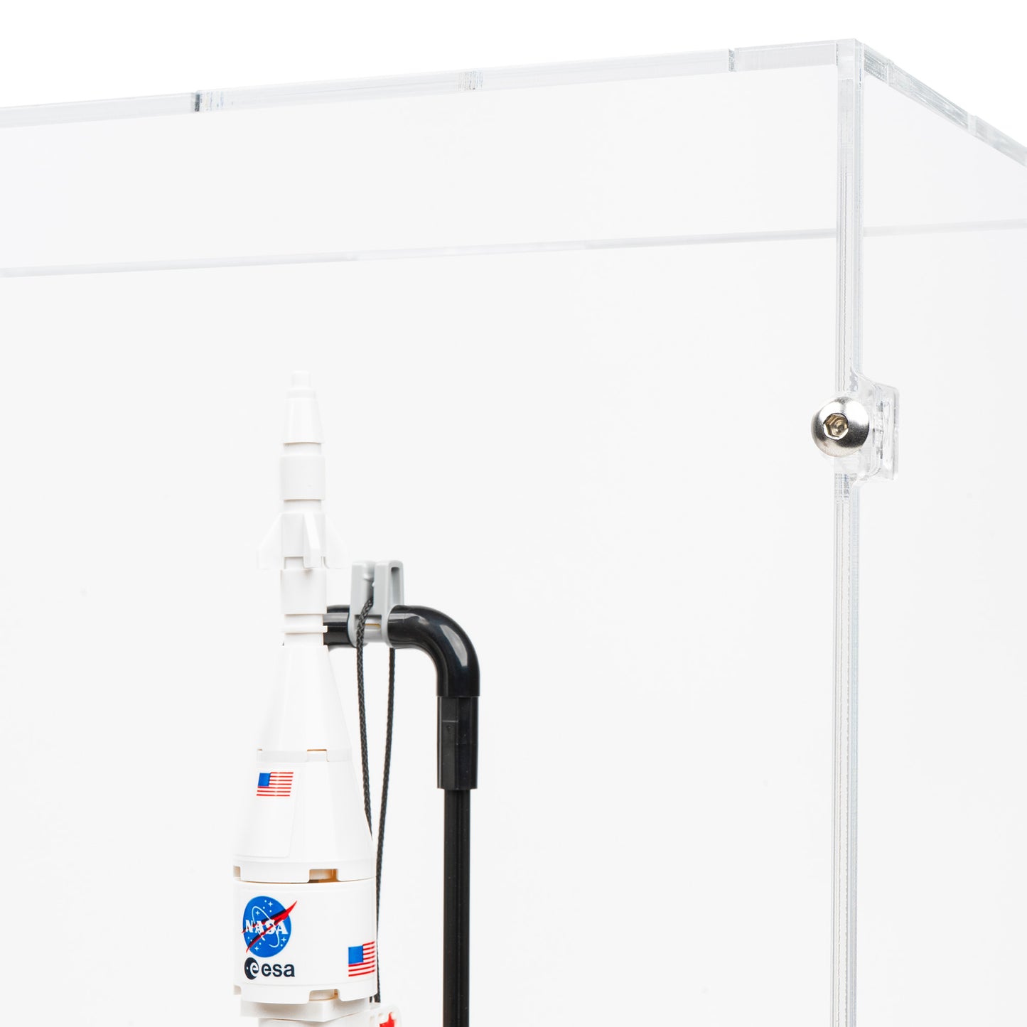 Fitting detail view of LEGO 42221 NASA Artemis Space Launch System Rocket Display Case.