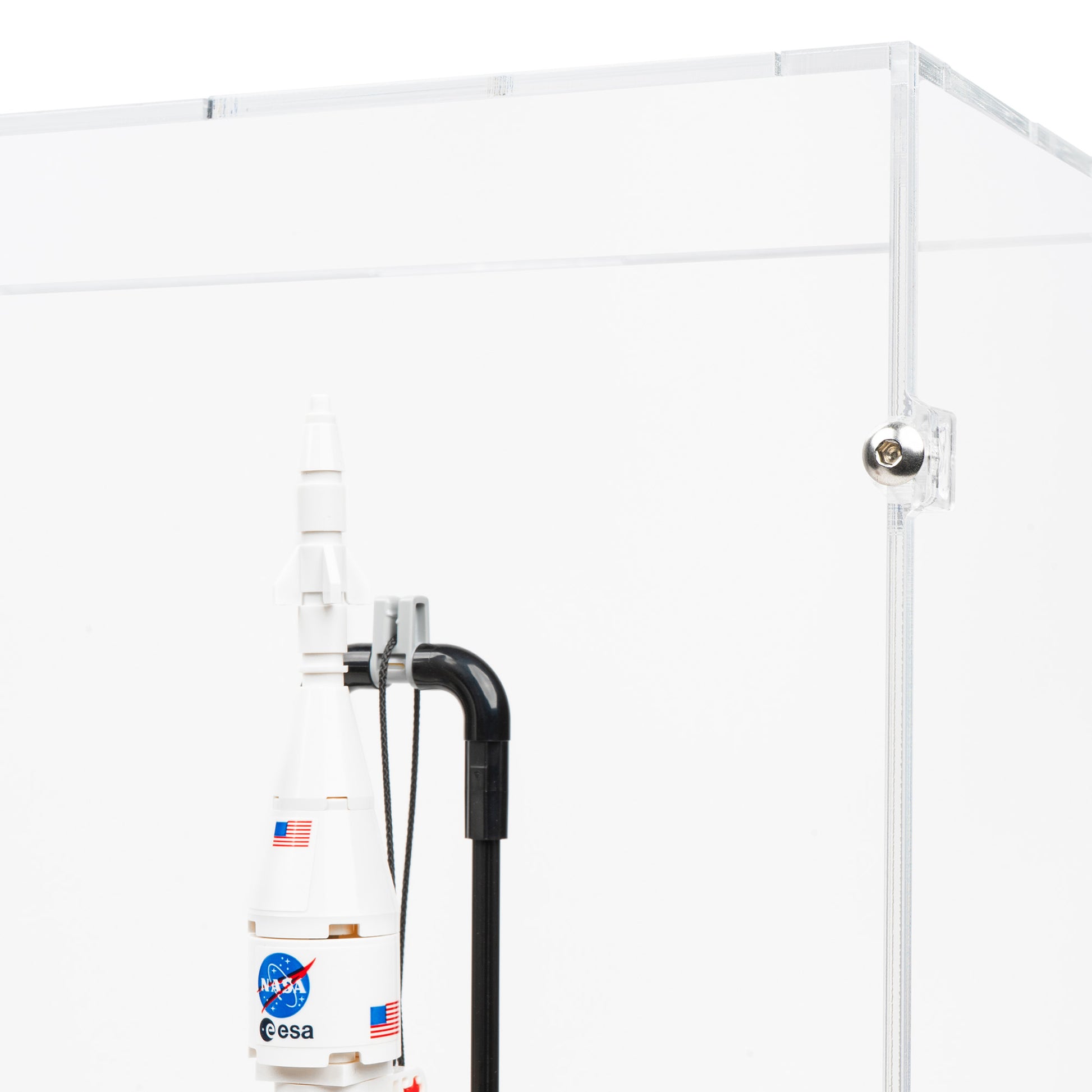 Fitting detail view of LEGO 42221 NASA Artemis Space Launch System Rocket Display Case.