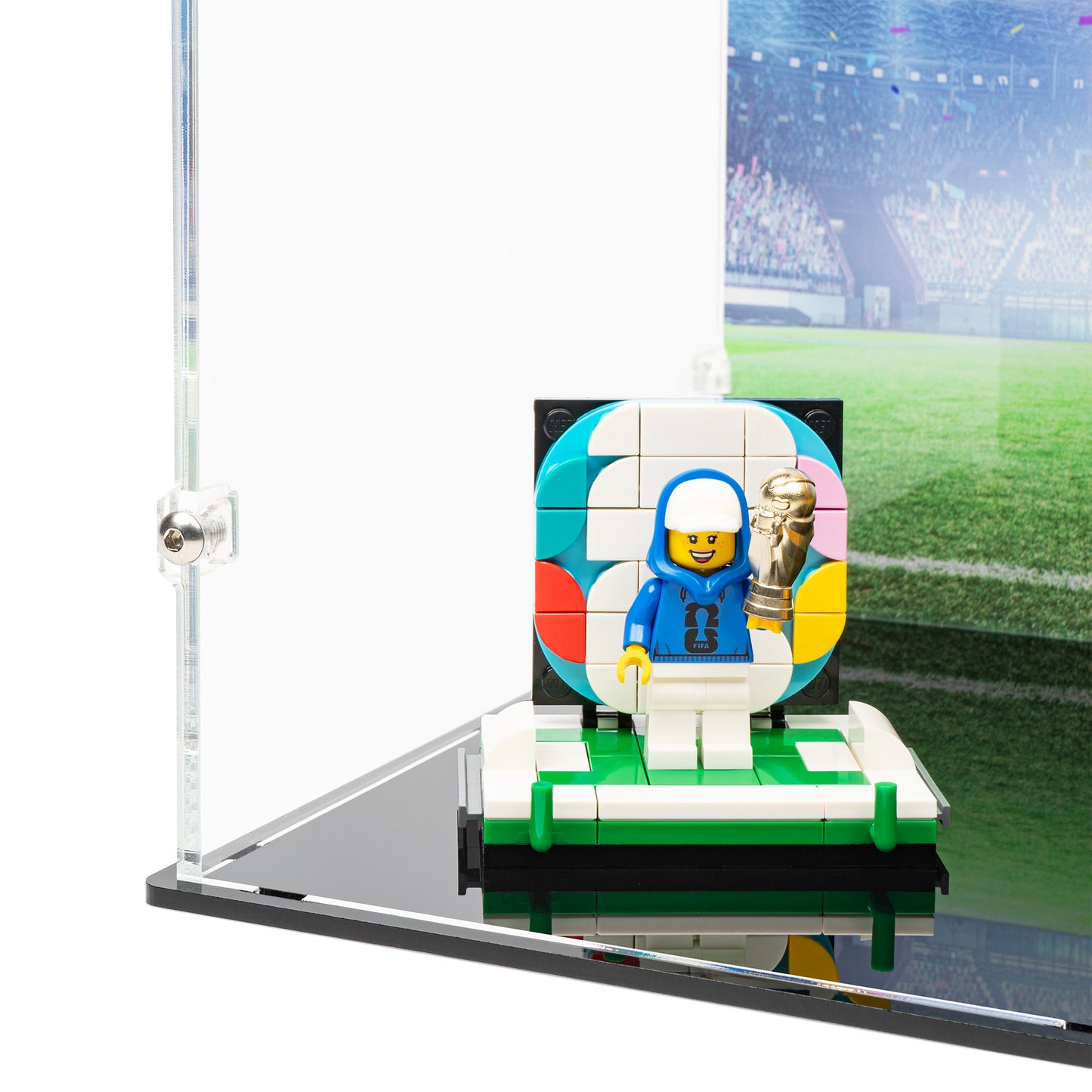 Minifigure detail view of LEGO 43020 FIFA World Cup Official Trophy Display Case with a UV printed background.