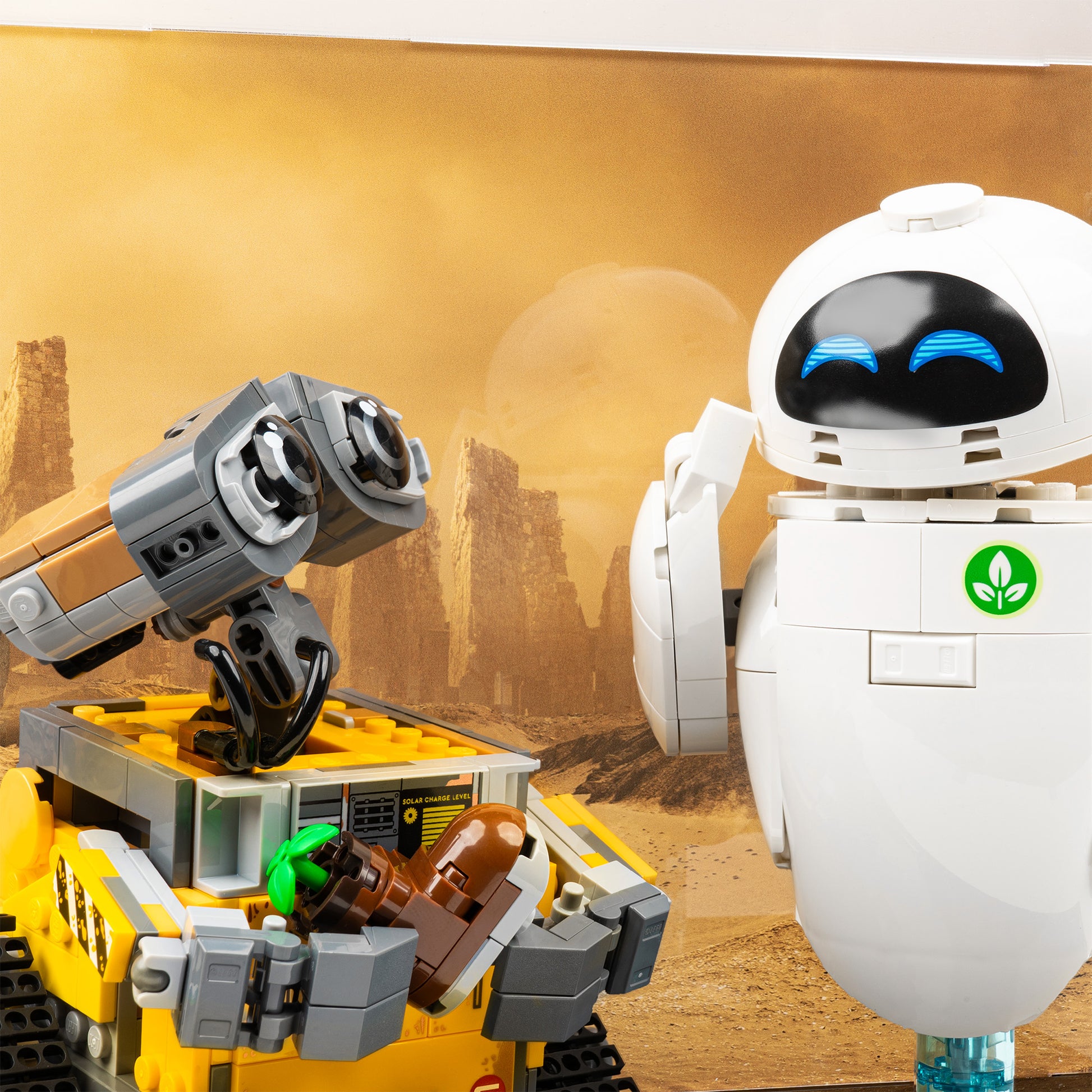 Closeup detail view of LEGO 43279 WALL-E and EVE Display Case with a UV printed background.