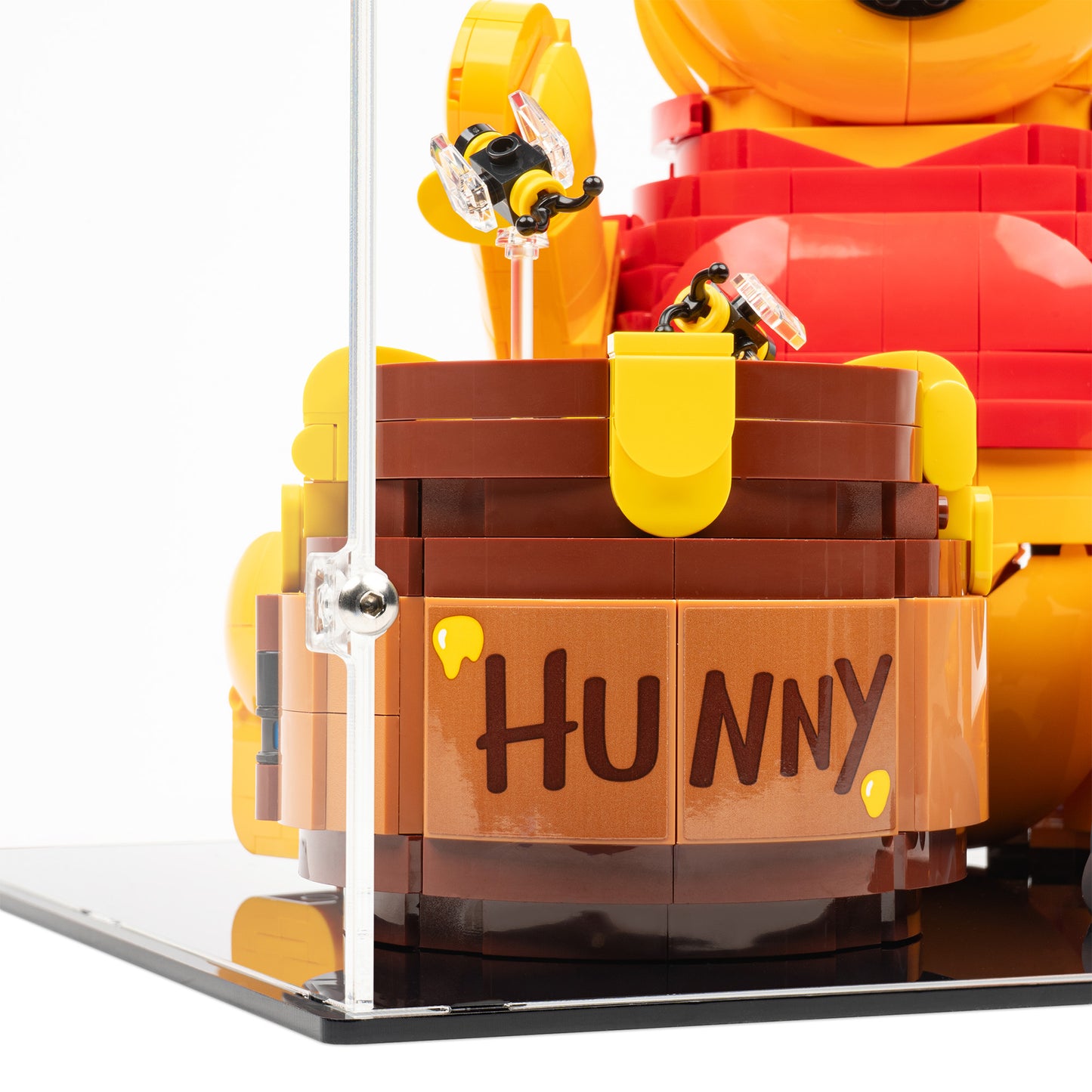 Fitting detail view of LEGO 43300 Winnie the Pooh Display Case.