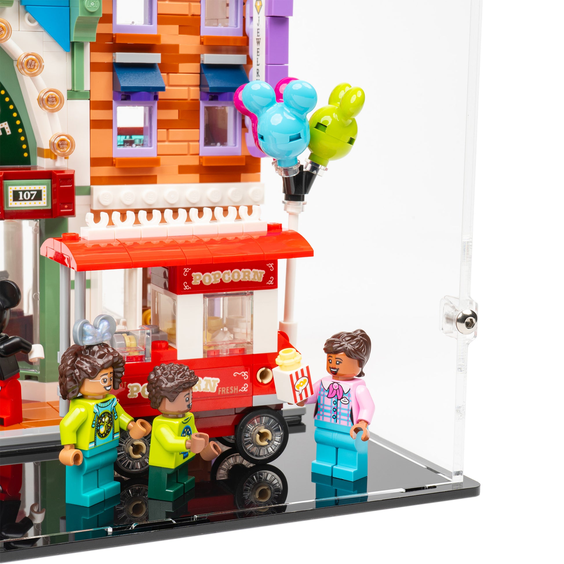 Fitting detail view of LEGO 43302 Main Street, USA Display Case.