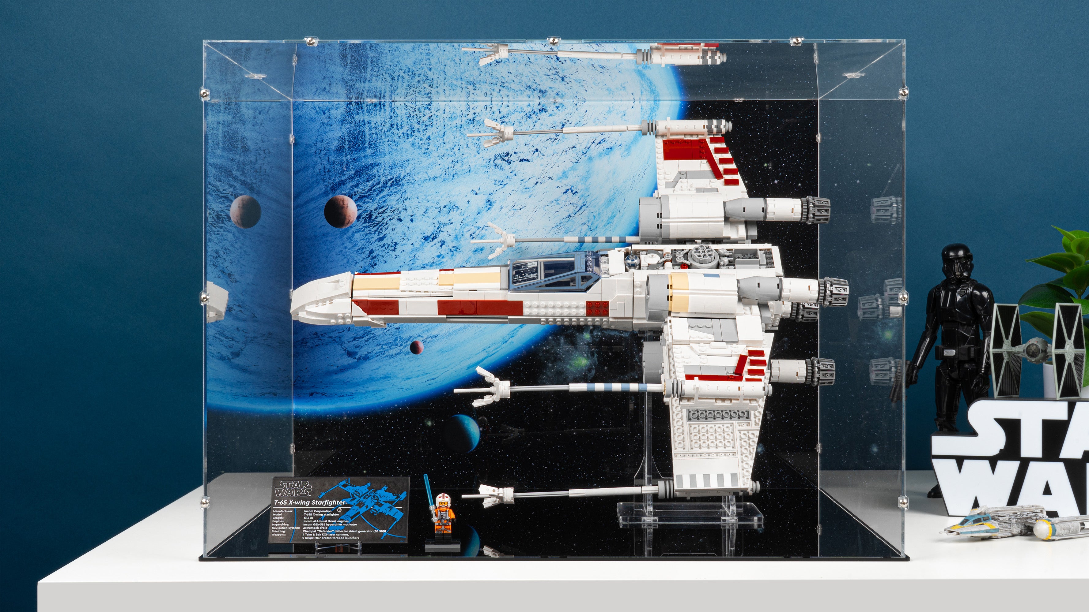 LEGO 75355 UCS X-Wing Starfighter Display Case and Stand with a UV printed background.