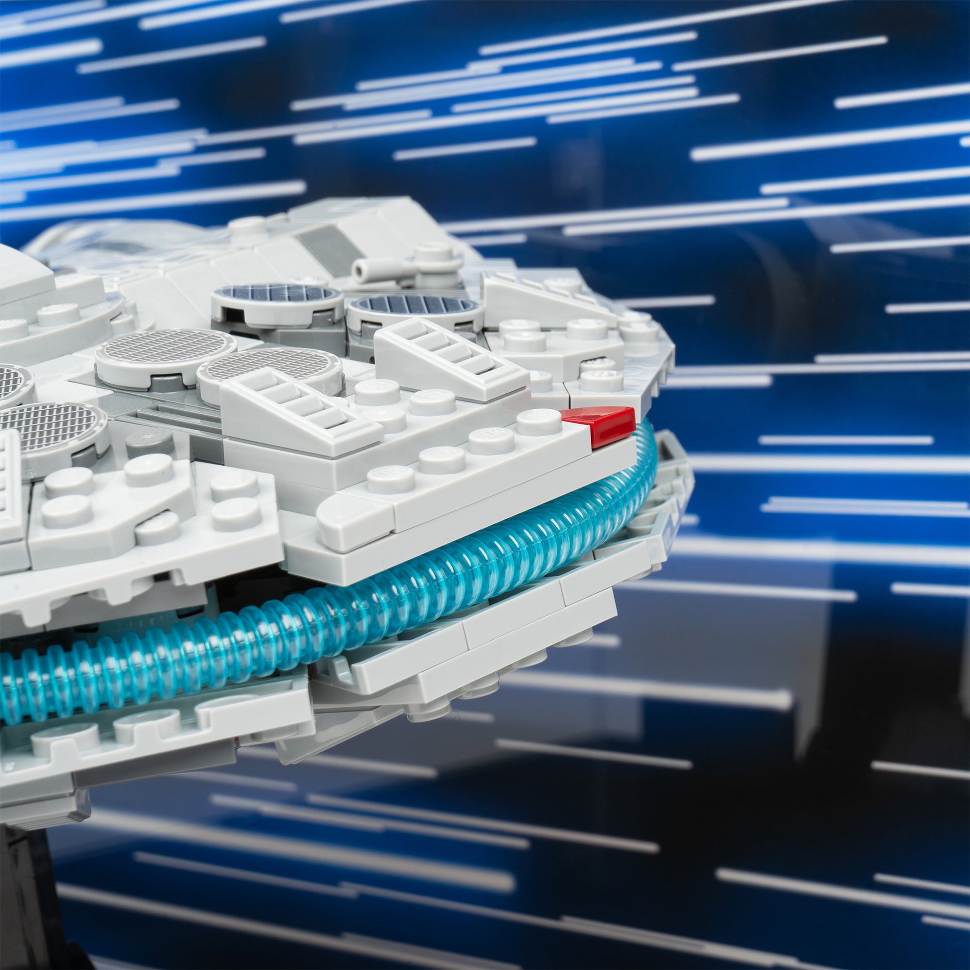Engine detail view of LEGO 75375 Millennium Falcon Display Case with a UV printed background.Angled view of LEGO 75375 Millennium Falcon Display Case with a UV printed background.