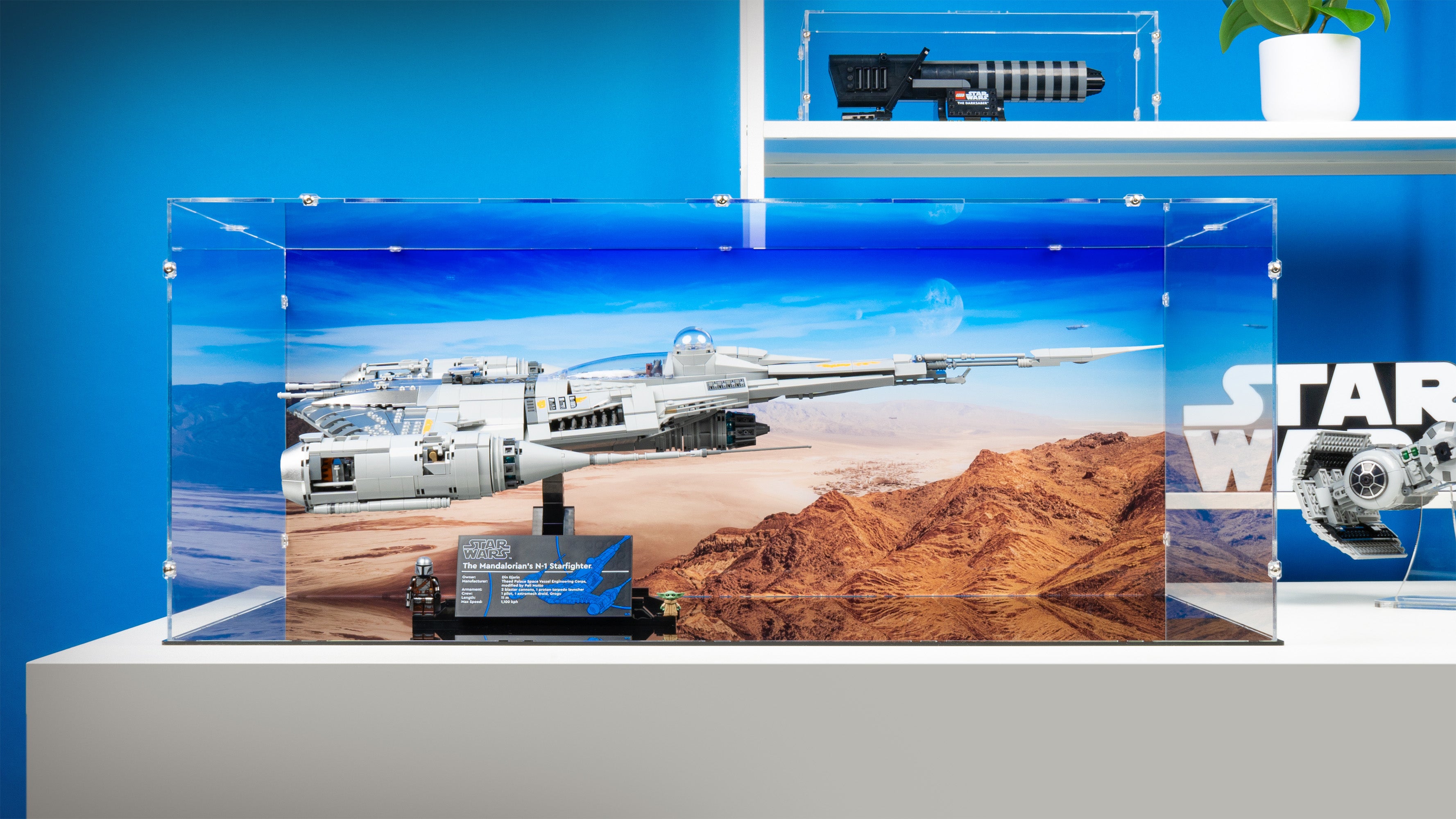 LEGO 75442 UCS The Mandalorian's N-1 Starfighter Display Case with a UV printed background.