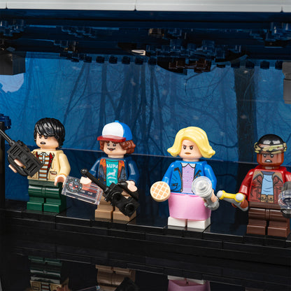 Kids detail view of LEGO 75810 The Upside Down Display Case with a UV printed background.